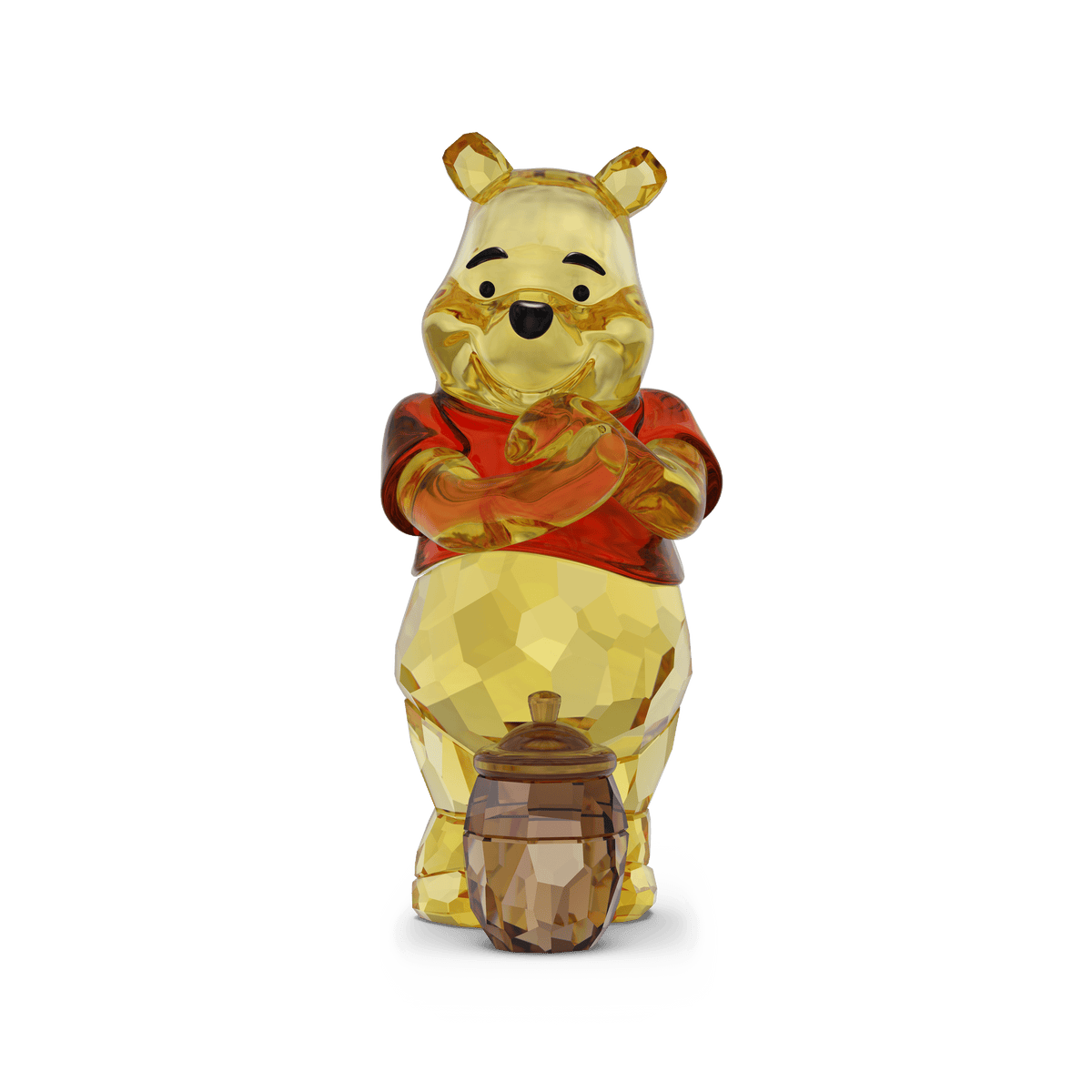 The Swarovski Winnie The Pooh by Swarovski is a faceted crystal figurine featuring Winnie the Pooh in a red shirt, holding a honey pot lid with a honey pot at his feet, set against a plain white background—a charming Disney collectible ideal for any fan.