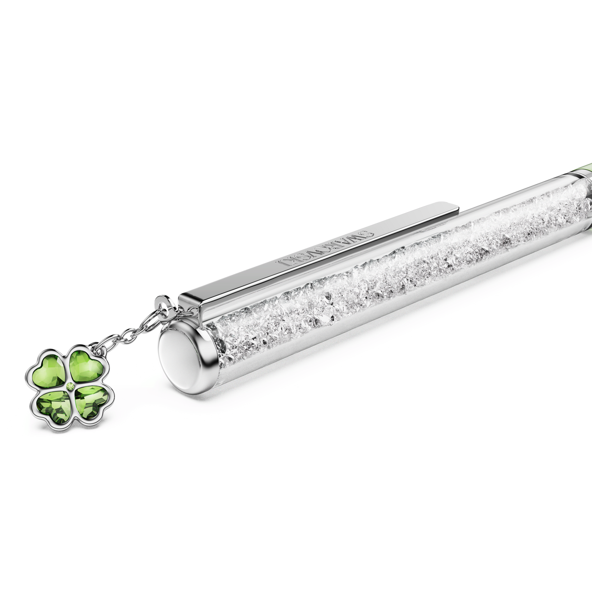 The Swarovski Crystalline ballpoint pen in green features a shimmering barrel filled with sparkling crystals and is adorned with a charming green four-leaf clover charm. With its elegant green lacquered finish and chrome-plated accents, this luxurious pen showcases Swarovski’s signature craftsmanship, adding a sophisticated touch to your writing experience.