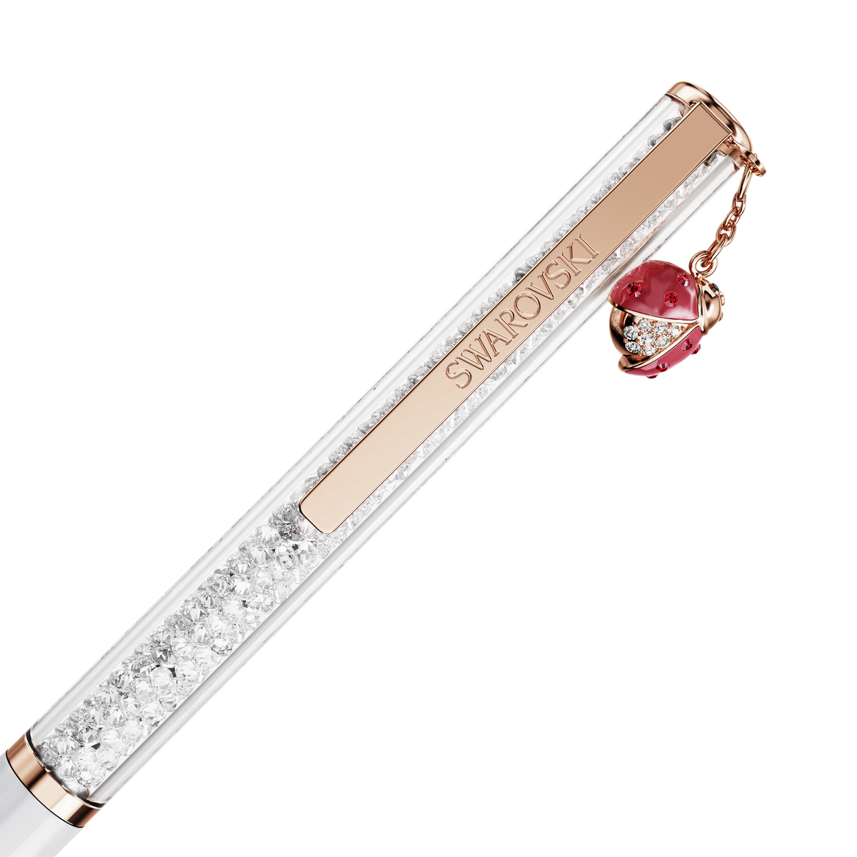 A slender Swarovski Crystalline ballpoint pen featuring a rose gold-tone clip, glimmering clear crystals inside the barrel, and a charming white and red ladybug accent adds sparkle and elegance to your everyday writing.