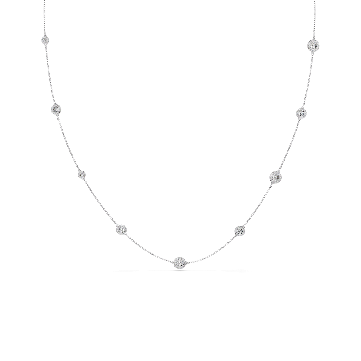 A delicate Swarovski Una Angelic strandage necklace featuring evenly spaced round-cut white crystals set along a fine rhodium-plated chain, displayed on a plain white background.