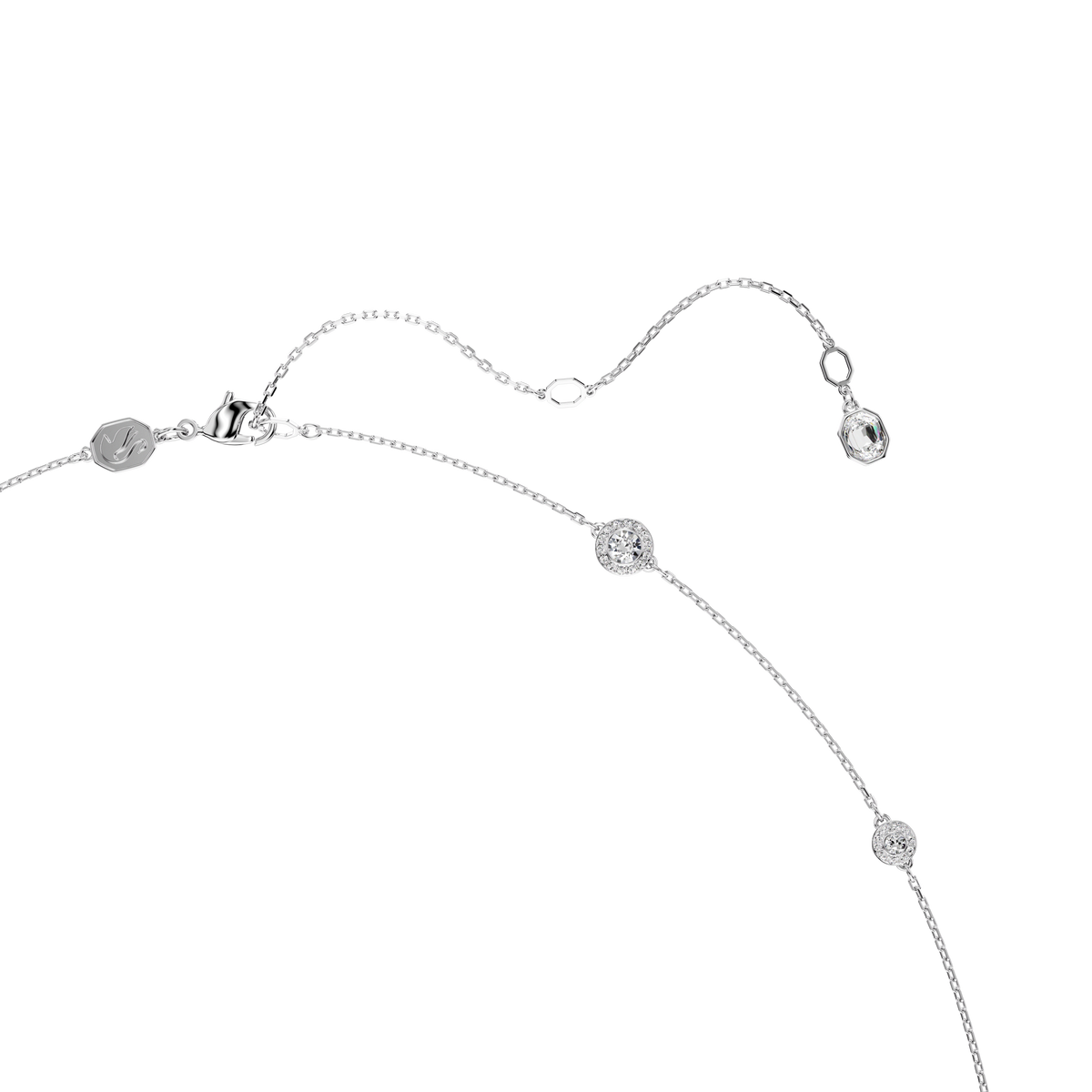 The Swarovski Una Angelic strandage necklace by Swarovski features an adjustable rhodium-plated chain adorned with three small round-cut white crystals, perfect for layering jewelry, and is displayed on a white background.