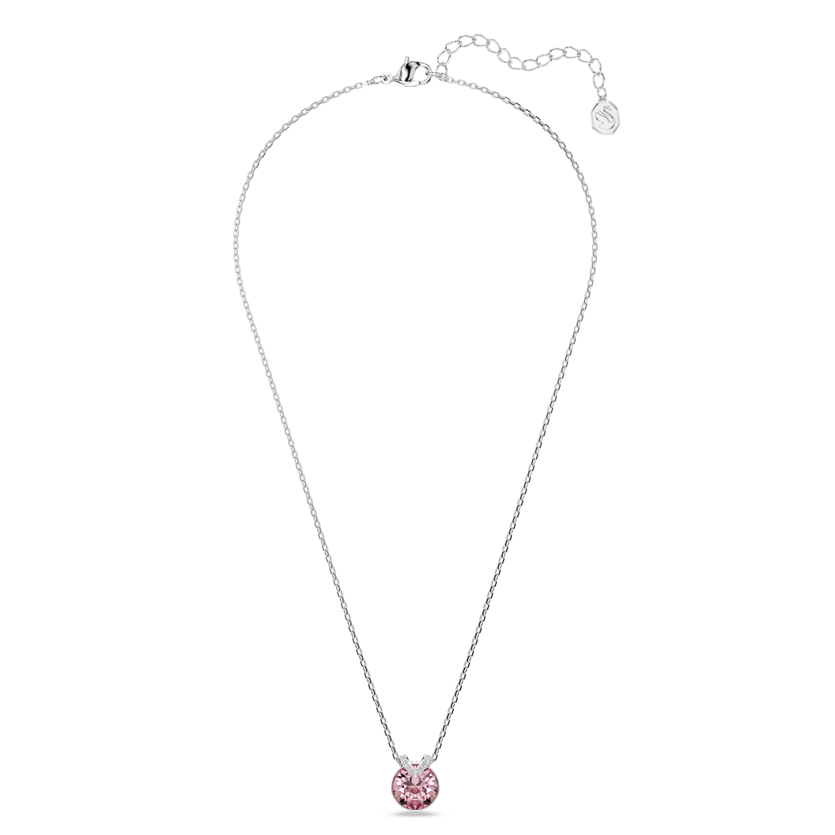 The Swarovski Bella V Pendant features a delicate silver-tone chain adorned with a small, round pink crystal in a brilliant cut. Expertly crafted and rhodium plated, this elegant necklace showcases sparkling accents and captures the timeless style of Swarovski Canada. Displayed on a plain white background, it exemplifies the quality and sophistication associated with the Swarovski brand.