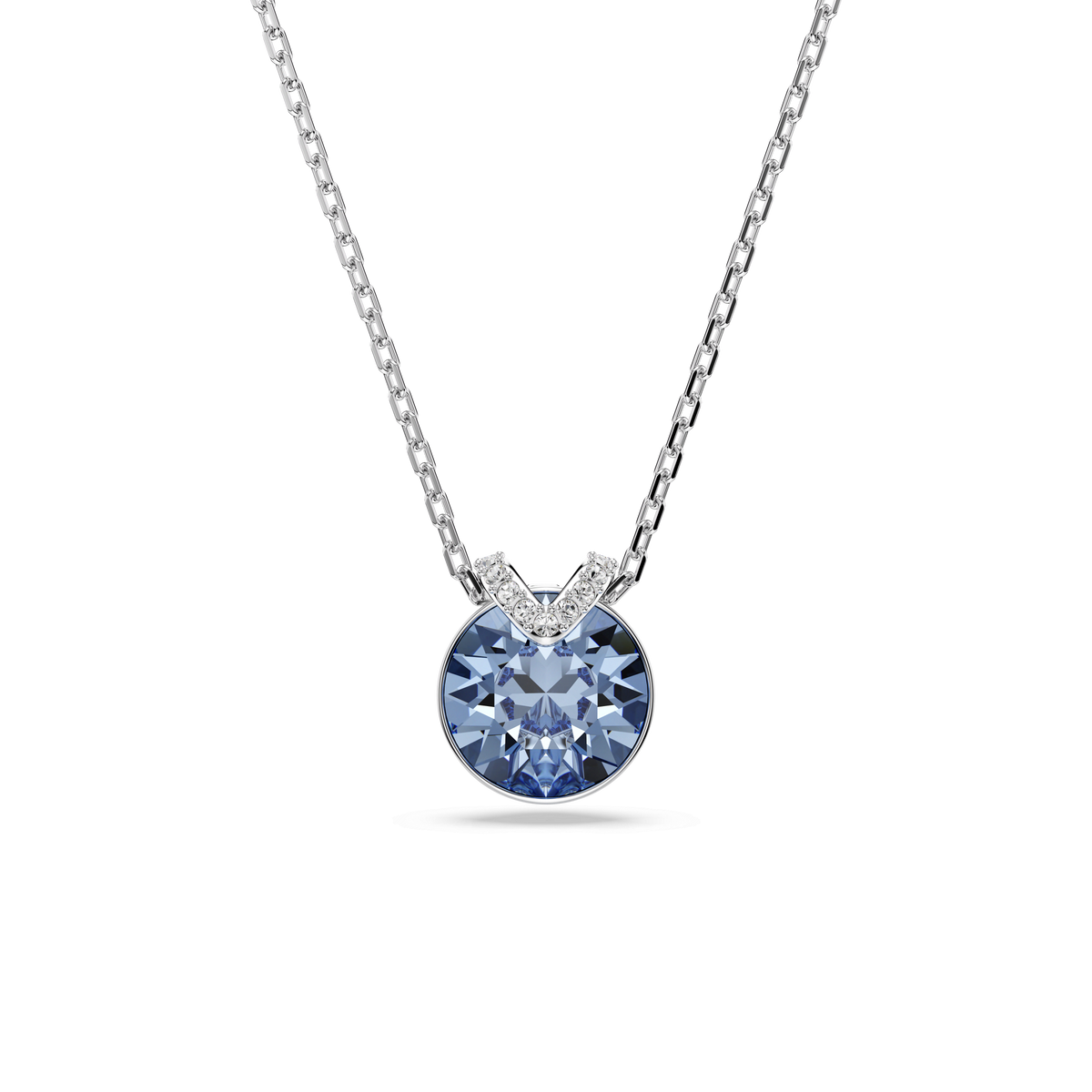 The Swarovski Bella V pendant showcases a round-cut blue crystal set in a rhodium-plated bezel, accented with a distinctive V-shaped detail adorned with sparkling clear stones. This elegant necklace is an ideal choice for those who appreciate the timeless allure of Swarovski jewelry.