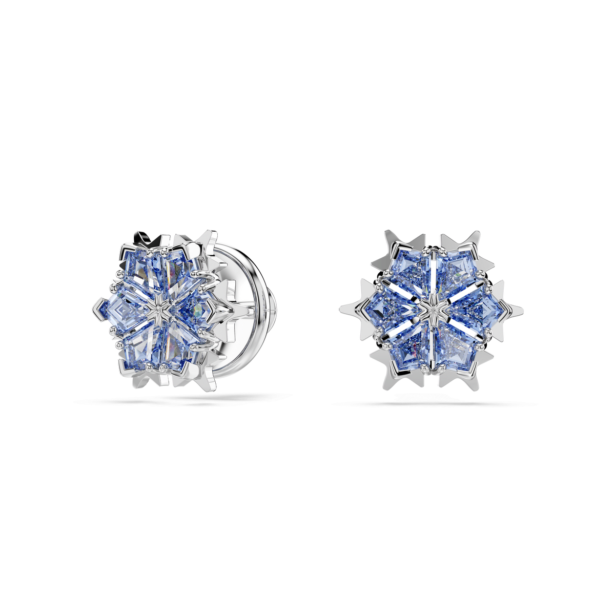Elevate your style with the Swarovski Magic stud earrings, featuring a blue snowflake design and rhodium plating. These elegant Swarovski earrings showcase brilliant blue stones arranged in a starburst pattern on a crisp white background, bringing sophisticated winter-inspired sparkle to any ensemble.