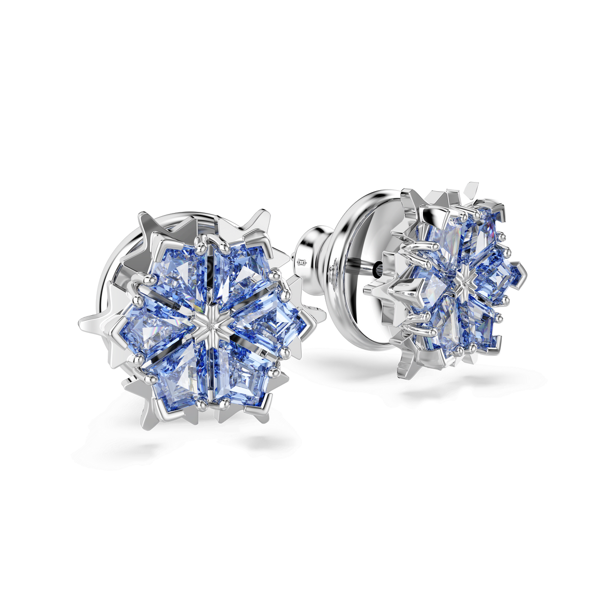A pair of Swarovski Magic stud earrings by Swarovski, featuring snowflake-shaped designs adorned with multiple blue stones in geometric patterns and crafted with sparkling Swarovski Zirconia, shown on a plain white background.