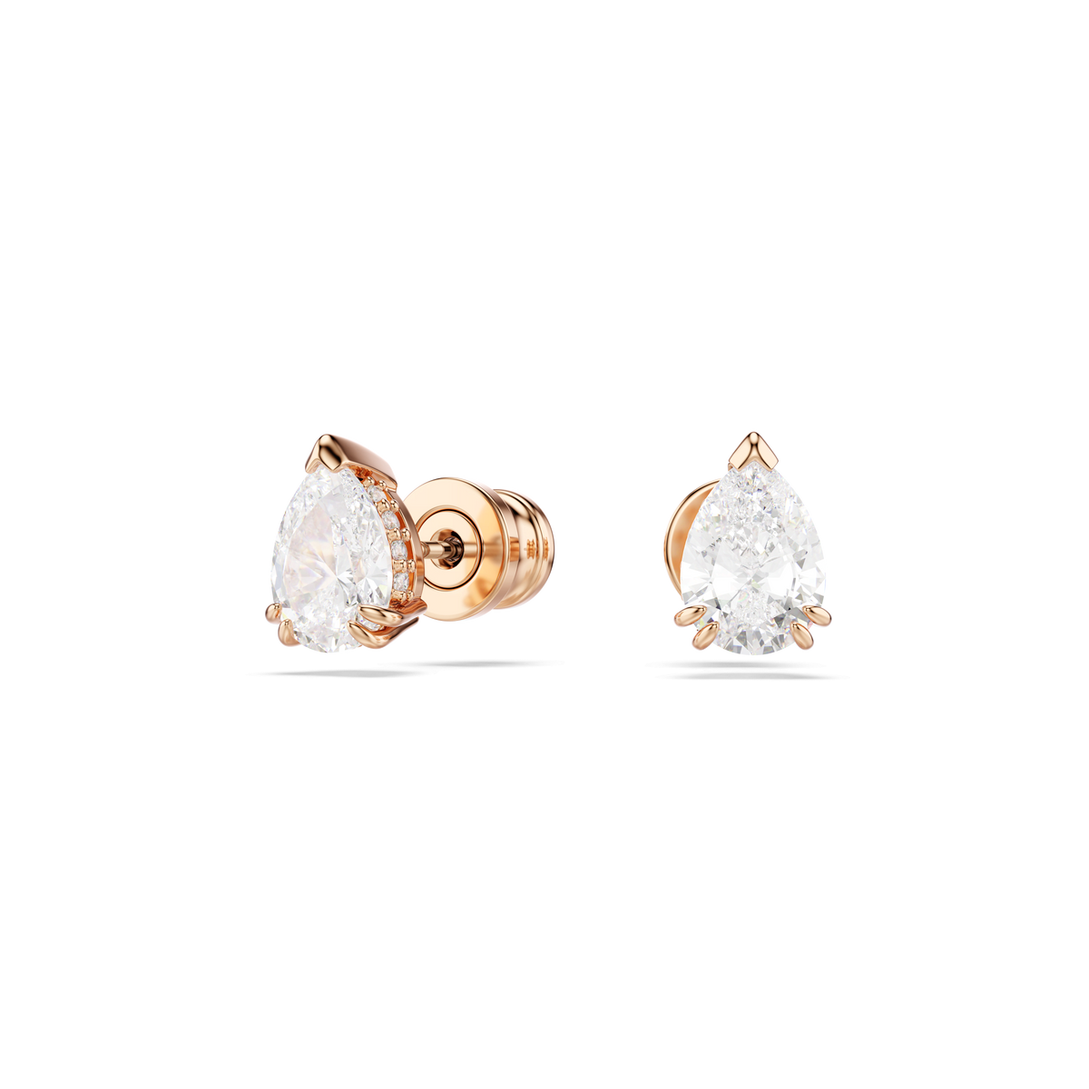 A pair of Swarovski Stilla stud earrings featuring pear cut white crystals and rose gold-tone plating, displayed on a plain white background.