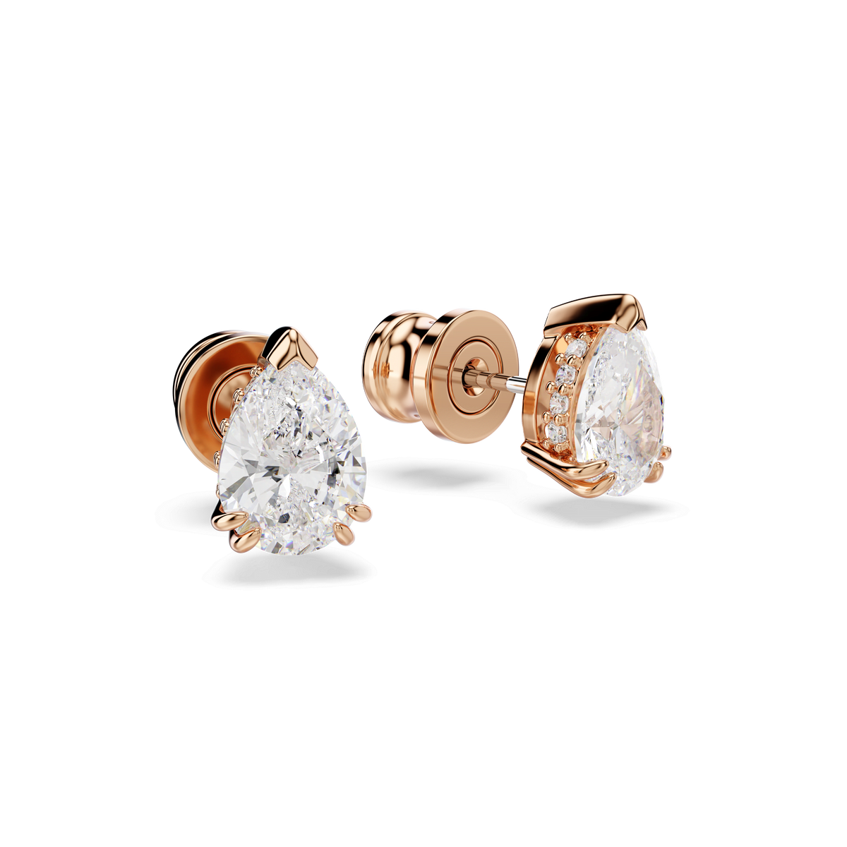 A pair of Swarovski Stilla stud earrings in rose gold-tone plating featuring pear cut white crystals held by prongs, displayed on a plain white background.
