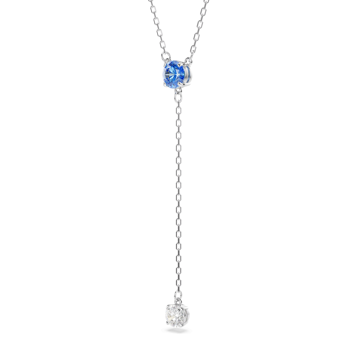 Swarovski Stilla Attract Y necklace by Swarovski, featuring a round blue stone at the top and a round clear stone at the bottom, both round cut and connected by a fine rhodium-plated chain, displayed against a plain white background.