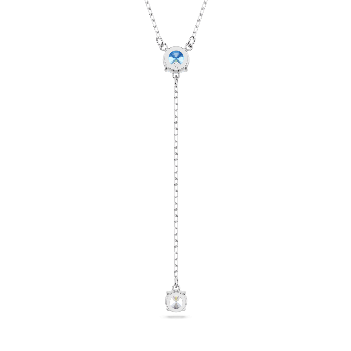 The Swarovski Stilla Attract Y Necklace features a minimalistic and elegant design, with a vertical silver-tone rhodium plated chain adorned by a round blue gemstone at the top and a smaller round white stone at the bottom. Perfect for any occasion, this refined piece from Swarovski is an exquisite addition to your jewelry collection.