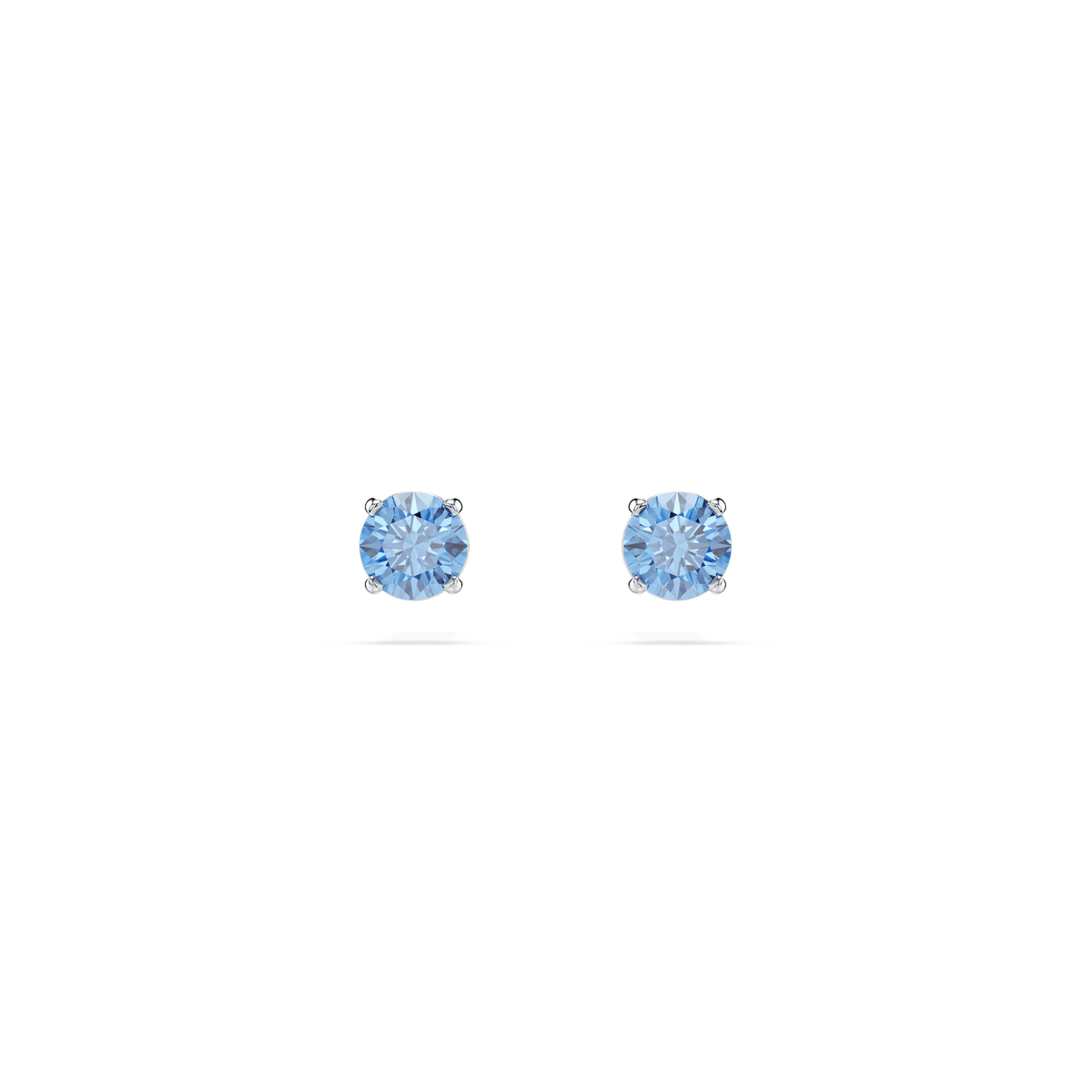 A pair of Swarovski MP Stilla Earrings: PE STUD FANBL/RHS, featuring round light blue gemstones set in silver prongs, displayed against a plain white background—an elegant example of Swarovski earrings from Swarovski Canada.