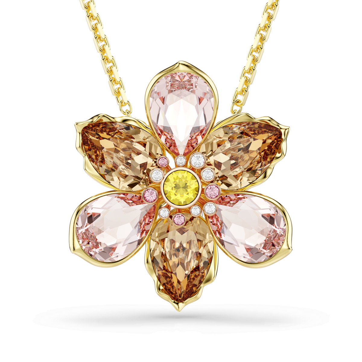 Experience elegance with the Swarovski Idyllia Pendant Brooch MUL/GOS, a stunning gold flower-shaped piece featuring six delicate petals crafted from pink and amber stones. The center sparkles with small white and pink gems encircling a brilliant yellow stone, all beautifully suspended from a gold chain. Available at Raffi Jewellers, an official retailer of Swarovski Canada.