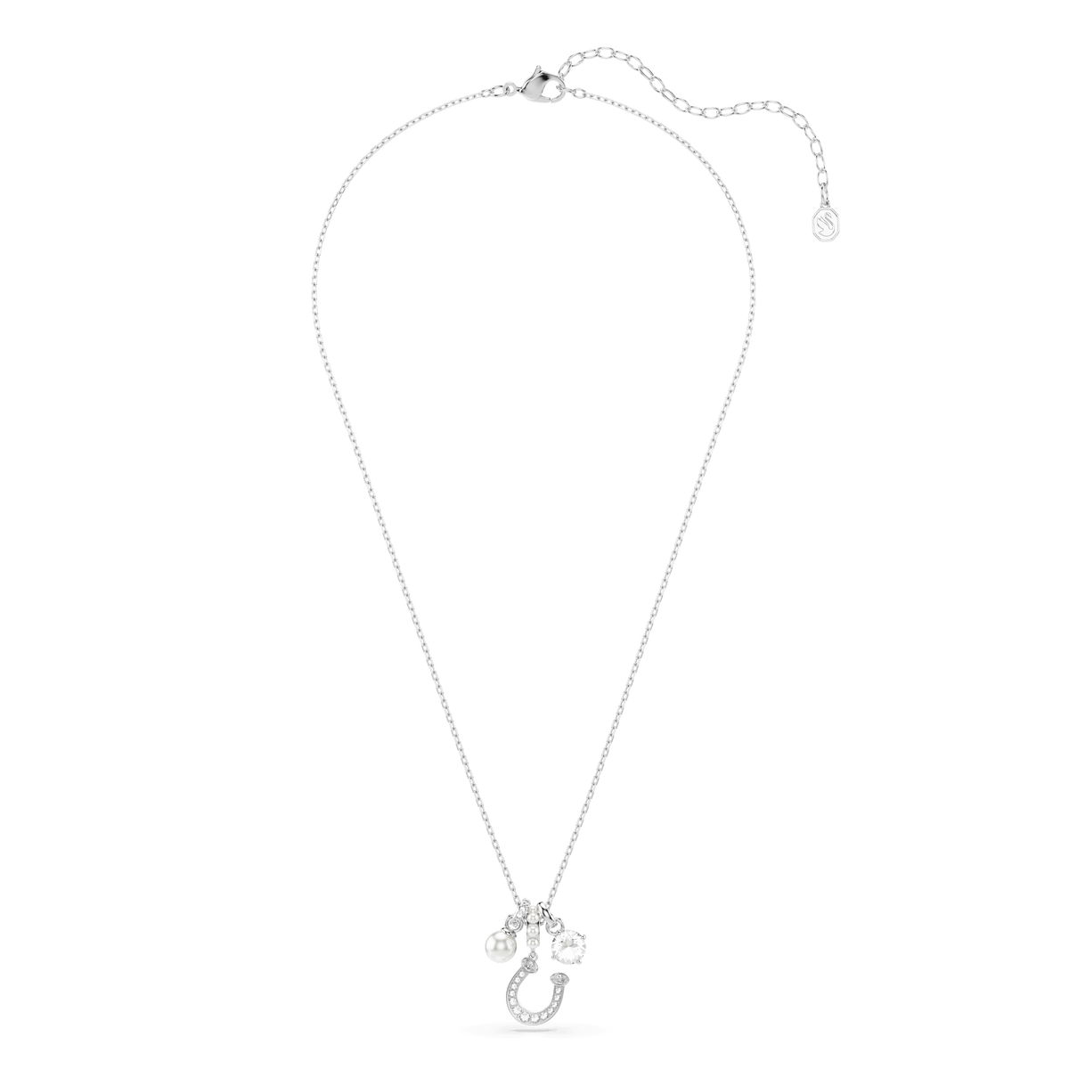 The Swarovski Symbolica pendant features a round-cut pavé horseshoe design in rhodium plating, adorned with a white crystal pearl and accented by delicate charms, all displayed on a plain white background.