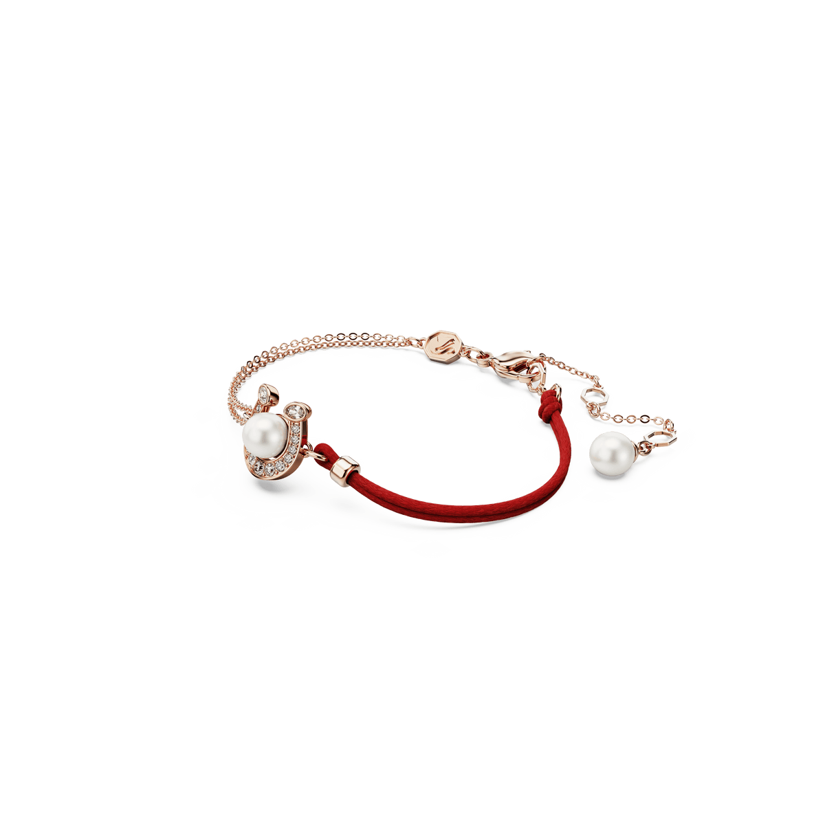 The Swarovski Symbolica bracelet features a delicate horseshoe design with a white crystal pearl, pavé accents, and an 18K rose gold finish, beautifully displayed on a plain white background.