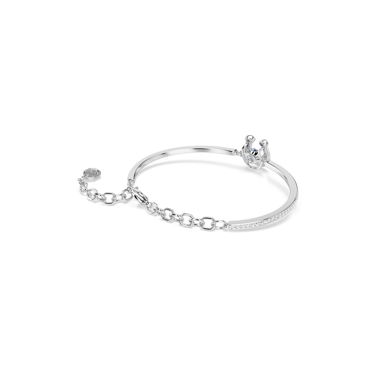 A refined Swarovski Symbolica bangle featuring a round-cut pavé horseshoe charm in blue and a rhodium-plated adjustable band, showcased against a plain white background.