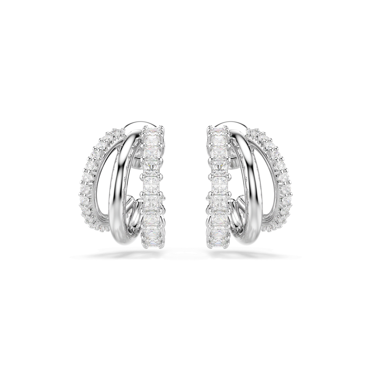 Discover the Swarovski Hyperbola hoop earrings by Swarovski—mini silver-tone double hoop earrings featuring round-cut, sparkling white gemstones artfully arranged along the front half of each rhodium-plated hoop, beautifully displayed against a plain white background.
