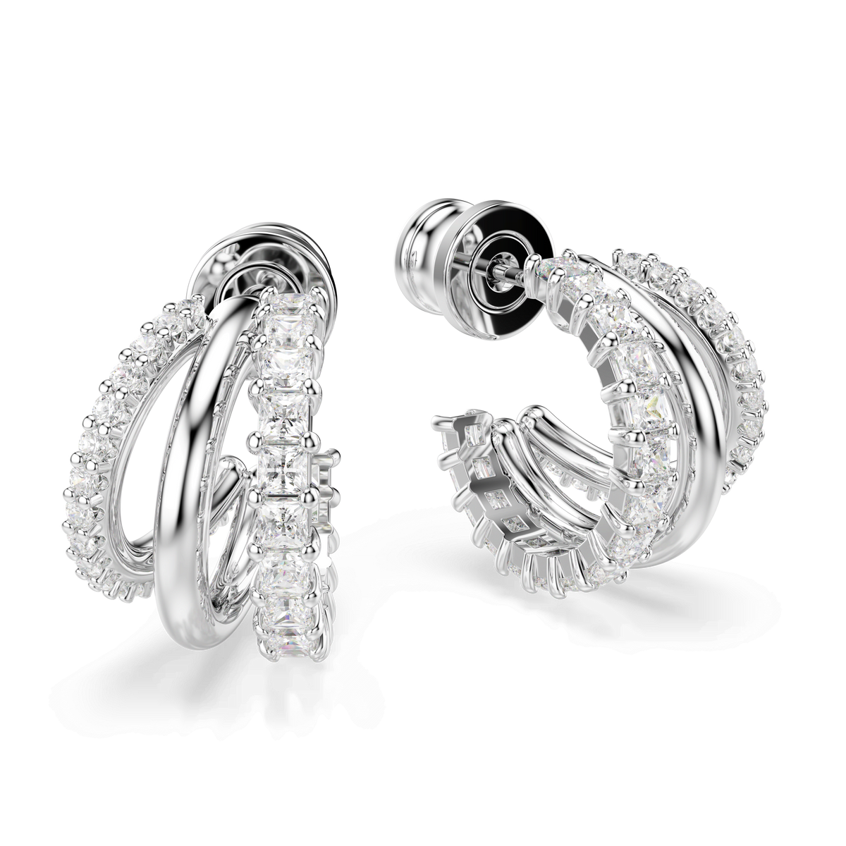 A pair of Swarovski Hyperbola hoop earrings, mini size, featuring round-cut white stones and finished with elegant rhodium plating, are displayed against a plain white background.