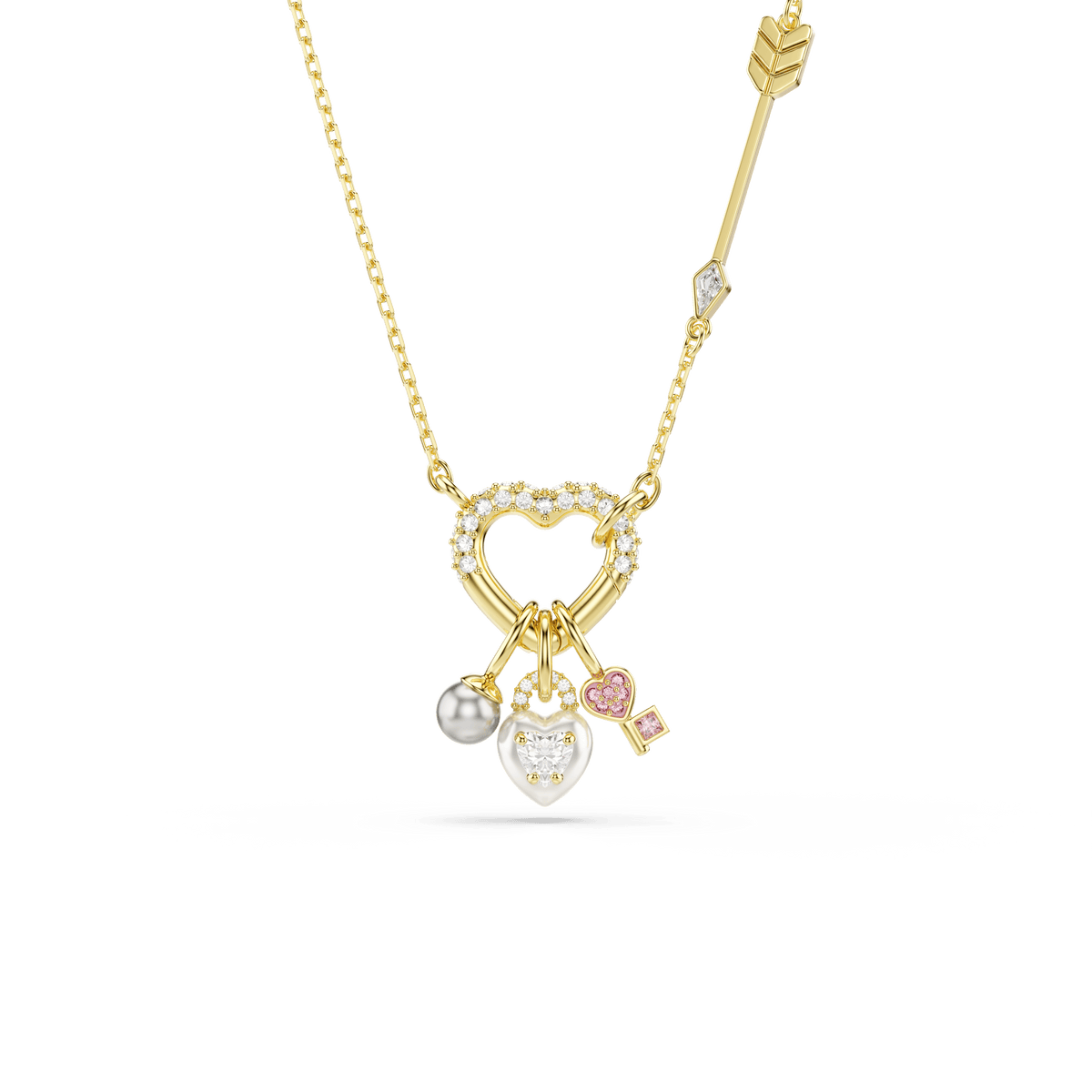 Introducing the Swarovski Idyllia pendant: an elegant necklace by Swarovski featuring a heart and key motif with mixed cut crystals. This 18K gold-finished piece is adorned with four distinctive charms—a Swarovski Crystal Pearl, a sparkling crystal heart, a pink gem heart, and a gold key set with a pink square crystal. The design is completed with a unique heart-shaped carabiner clasp for extra charm.