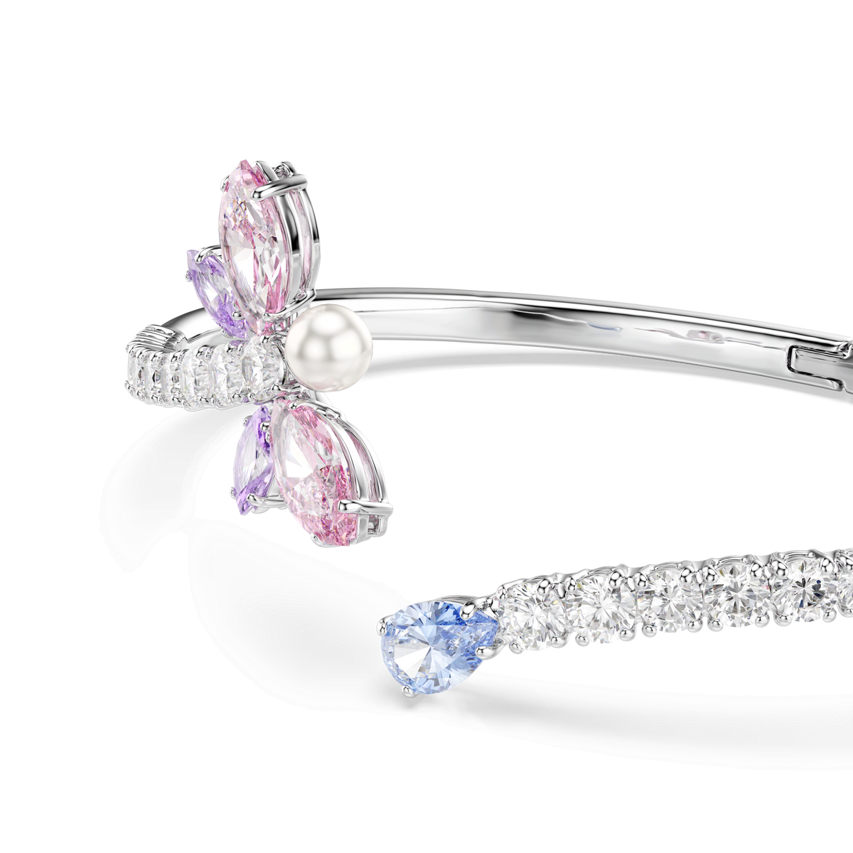 The Swarovski Ariana Grande x Swarovski bangle is a rhodium plated bracelet featuring a dragonfly motif in mixed multicolored cuts, highlighted by sparkling gems and elegant detailing from Swarovski.