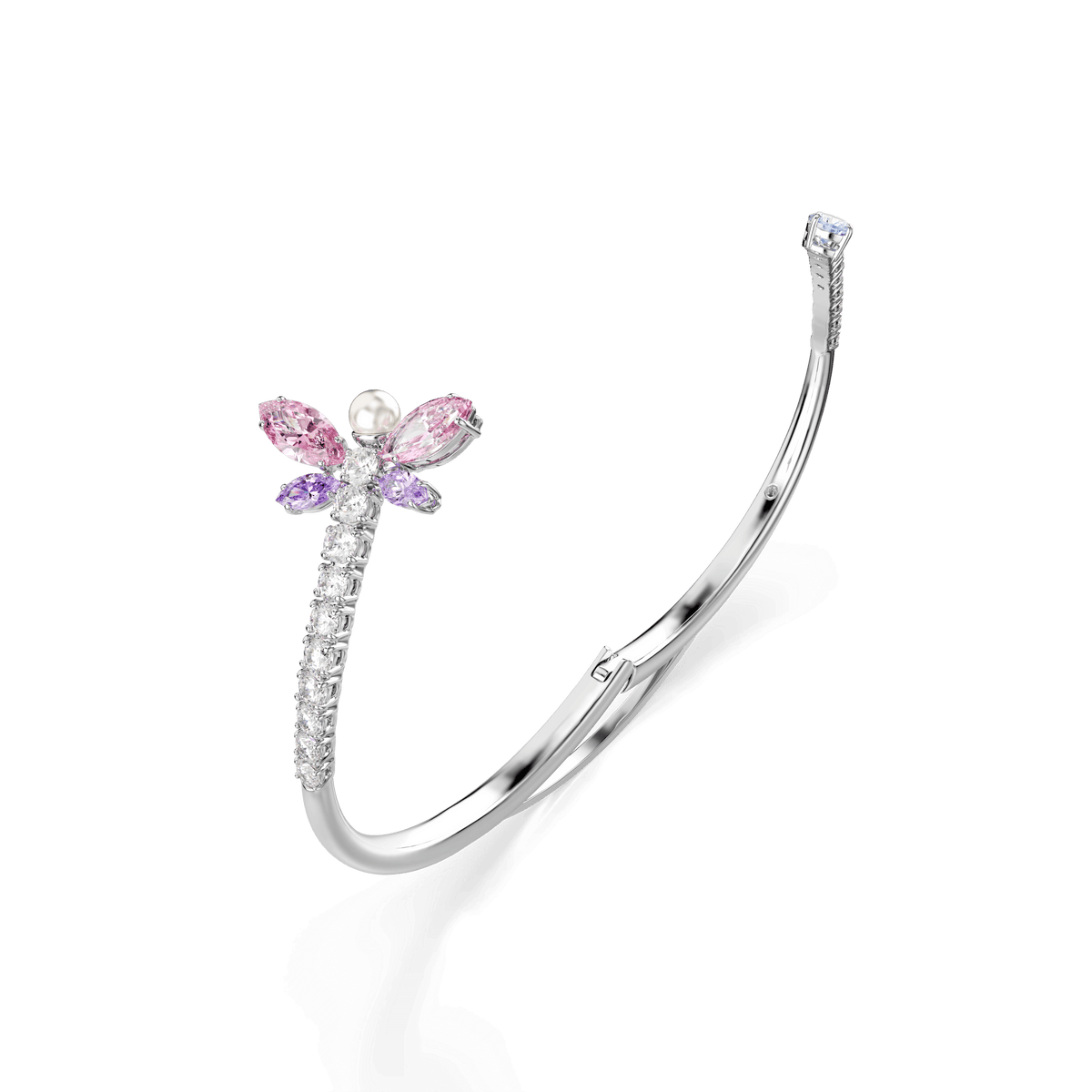 The Swarovski Ariana Grande x Swarovski bangle showcases a rhodium-plated dragonfly design with mixed-cut pink and purple gemstones for the wings, a pearl head, and clear Swarovski Zirconia stones along the body, all displayed on a white background.