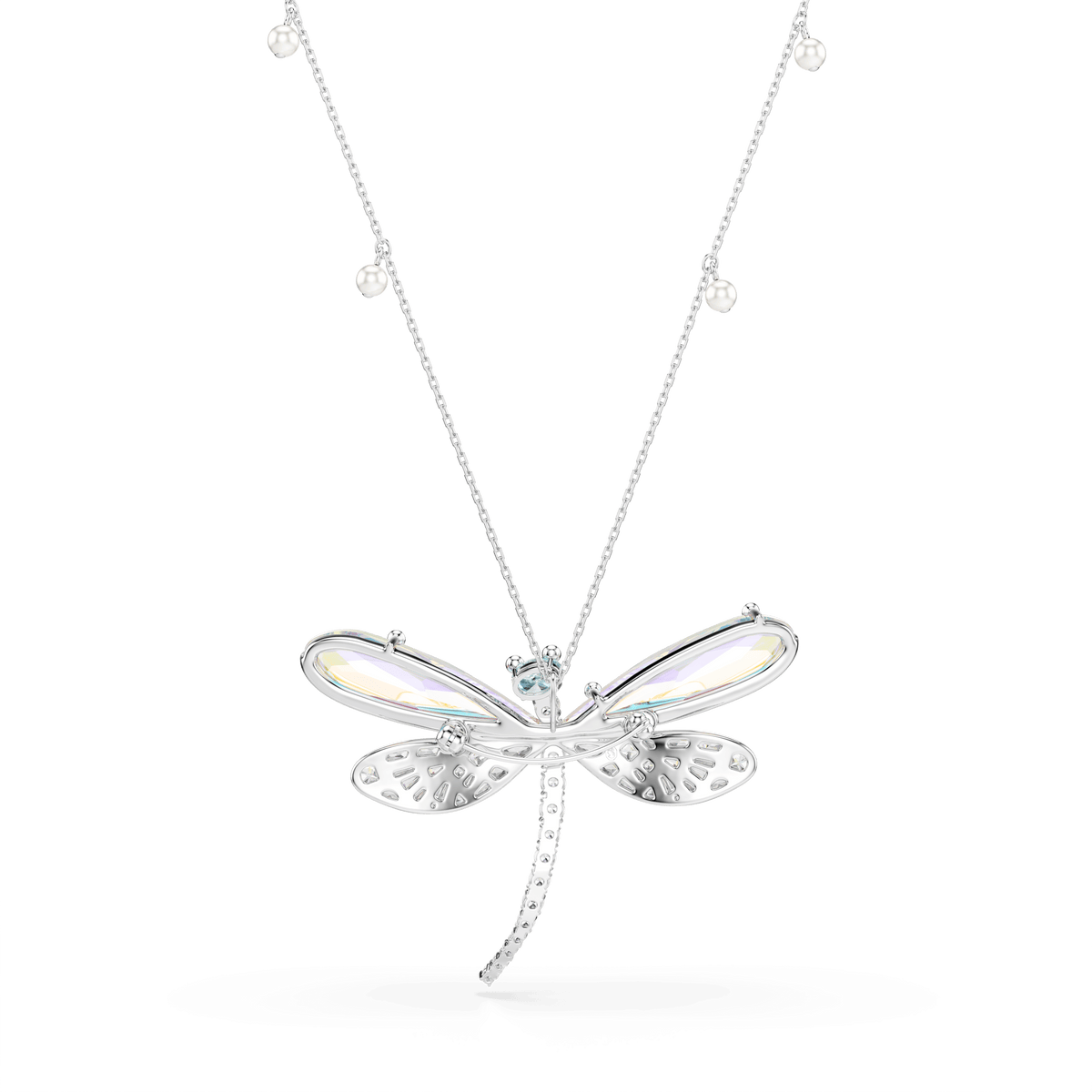 The Swarovski Ariana Grande x Swarovski pendant and brooch features a dragonfly design with mixed-cut crystals, luminous Crystal Pearls, and rhodium plating, gracefully suspended from a delicate chain with spaced tiny beads, all showcased against a plain white background.