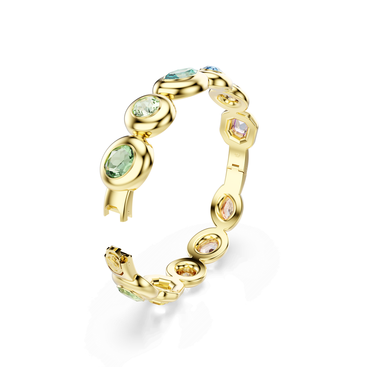 The Swarovski Gema bangle, by Swarovski, showcases mixed-cut multicolored gemstones in bezel-style settings with an 18K gold finish. Displayed on a plain white background, its asymmetrical crystals lend a contemporary touch to this elegant piece.
