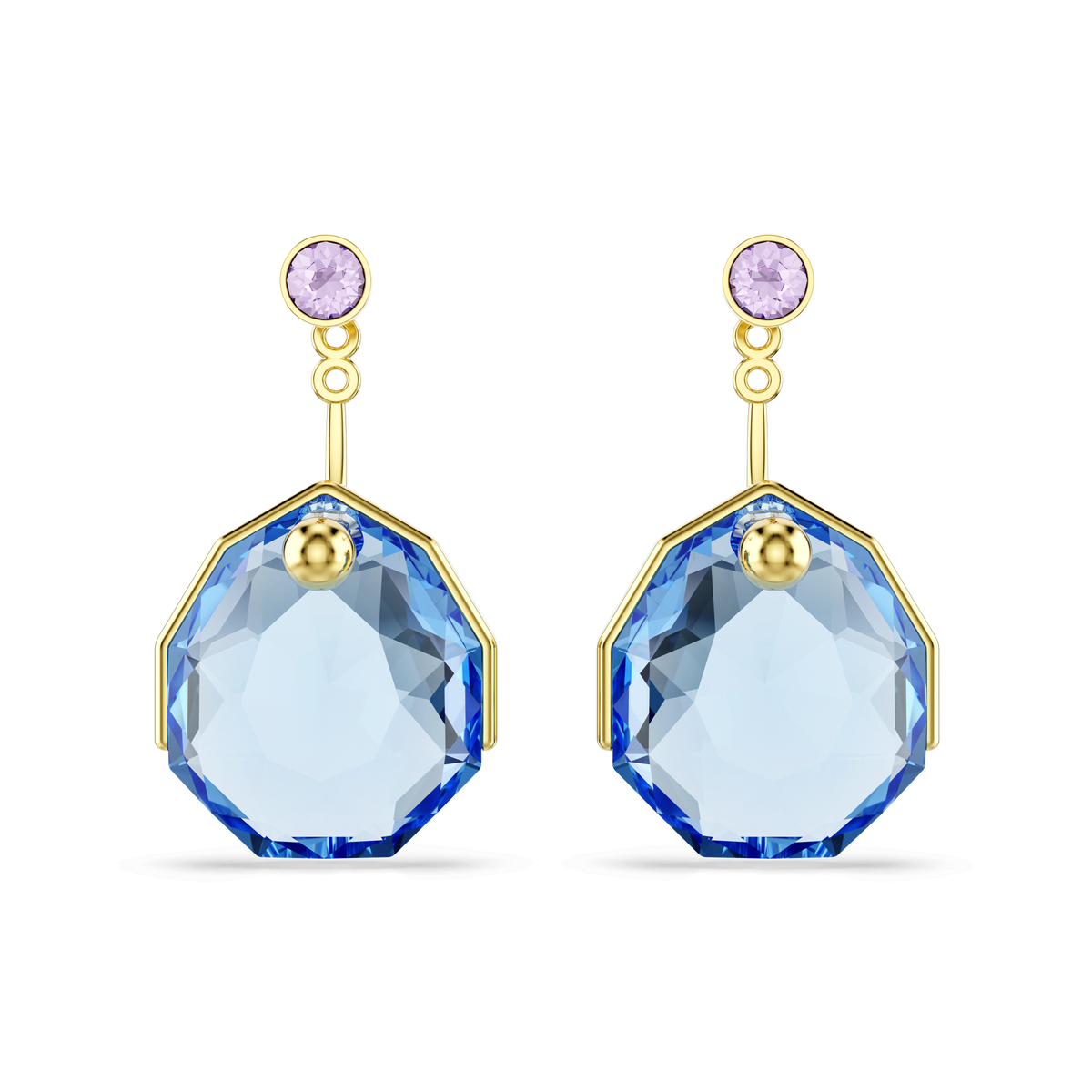 Swarovski Gema earring jackets, shown on a white background, feature round lavender faceted studs at the top with large blue octagonal faceted gemstones hanging below, all finished in radiant 18K gold.