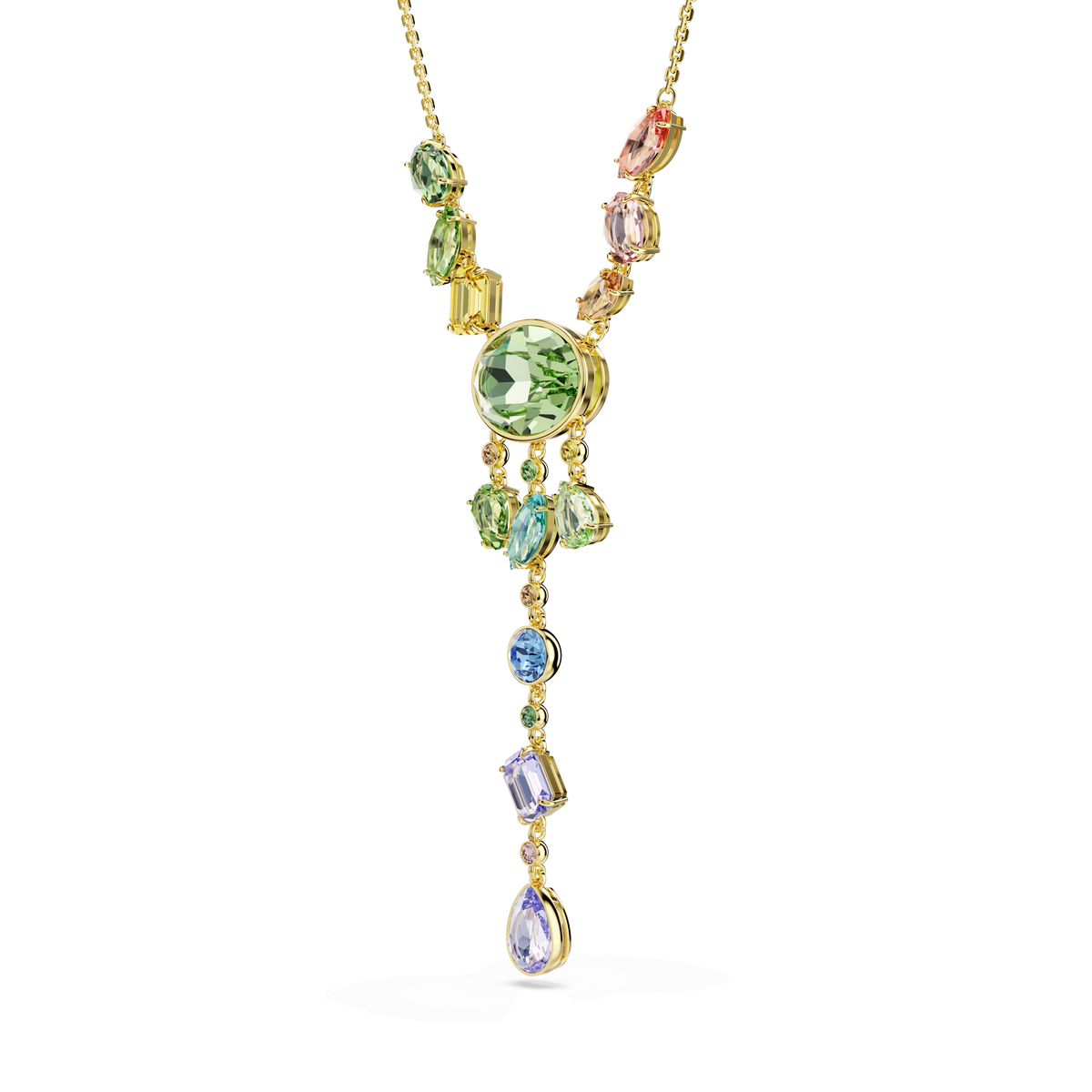 The Swarovski Gema Y necklace features an 18K gold finish and showcases an array of mixed-cut, multicolored gemstones—including exquisite Swarovski Recreated crystals in green, pink, blue, and purple—arranged in a striking asymmetrical cascade.
