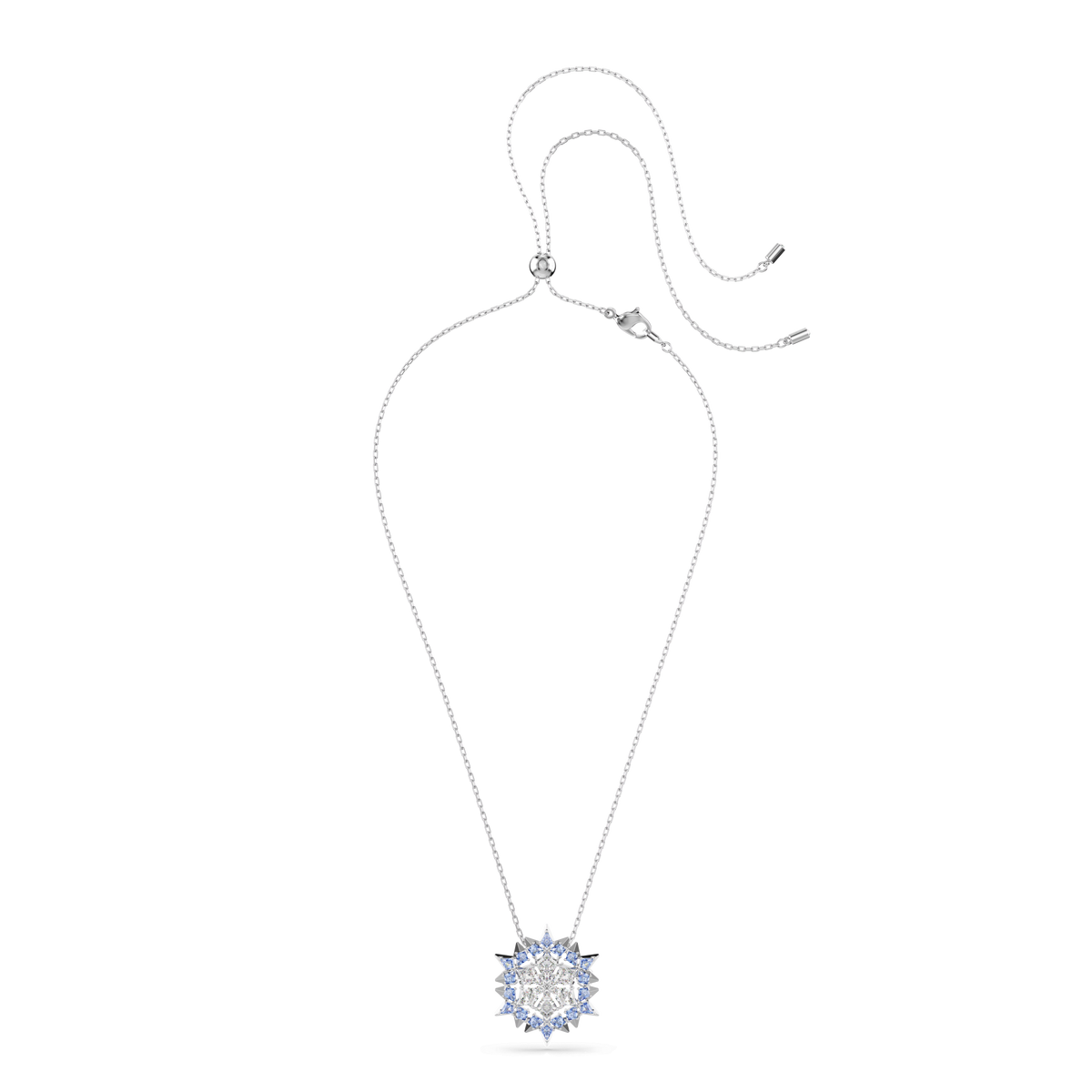 Swarovski Magic pendant and brooch Snowflake, Blue, Rhodium plated is displayed on a white background, featuring an elegant sunburst-inspired design adorned with clear and light blue gemstones. The silver chain includes a lobster clasp and an adjustable slider, reflecting the sophisticated style of Swarovski Canada’s Magic pendant collection.