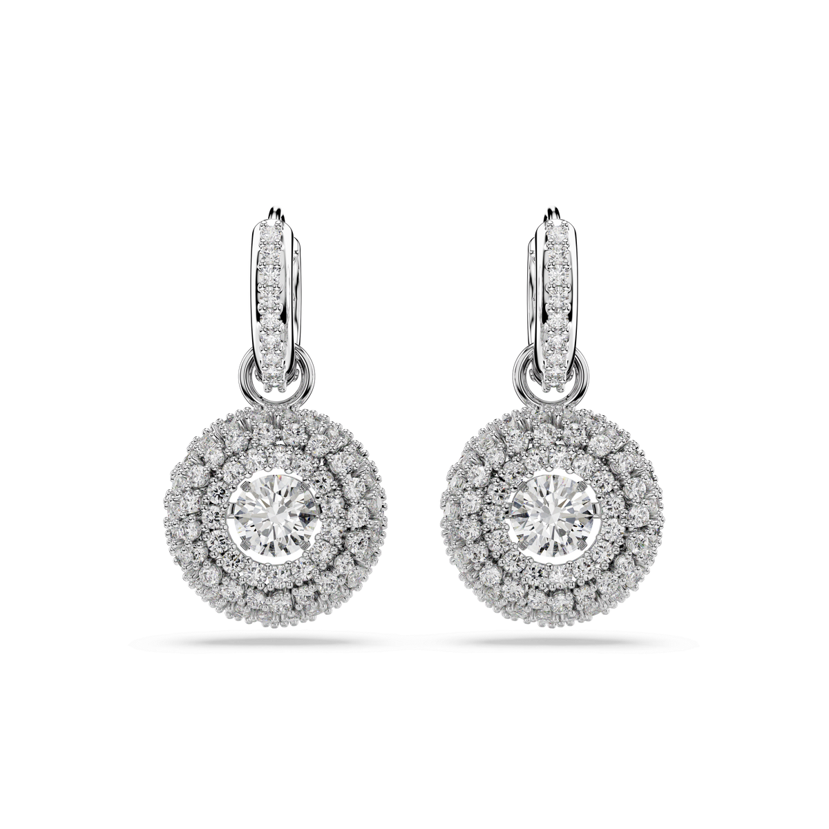 A pair of Swarovski Sublima drop earrings, featuring dazzling round-cut center stones encircled by two halos of sparkling Swarovski diamonds and set in rhodium plating, hang from diamond-studded hooks against a plain white background—an exquisite jewelry piece by Swarovski, perfect for any occasion.