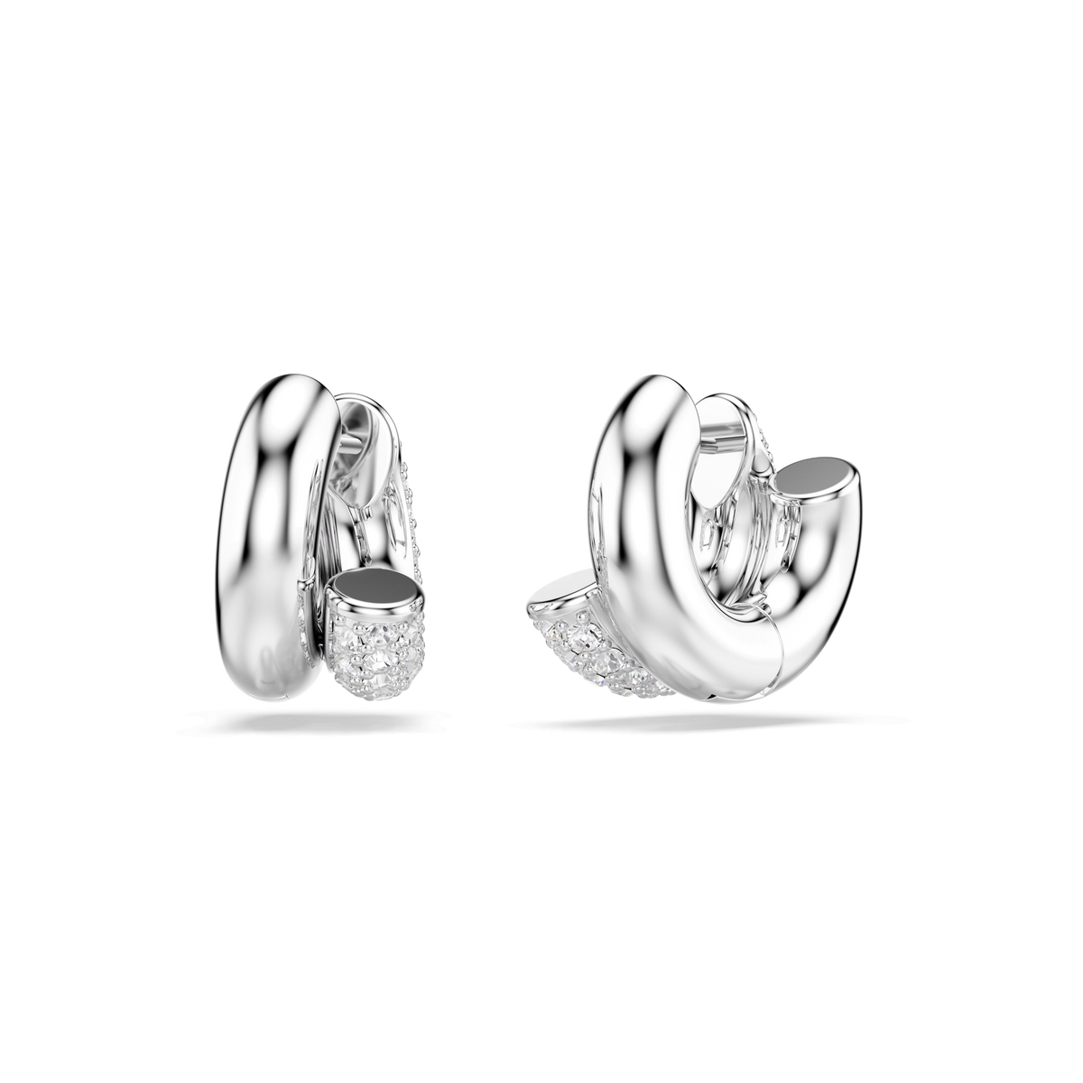 Showcased against a plain white background, the Swarovski Dextera hoop earrings by Swarovski feature a mini, chunky tubular design in rhodium plating, accented with small round-cut pavé-set white crystals on the lower front for added brilliance.