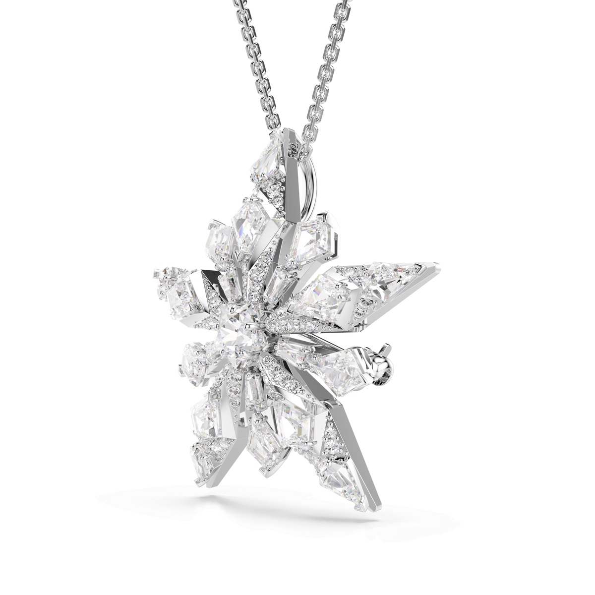 Introducing the Swarovski Idyllia Star pendant and brooch—a beautifully elegant piece by Swarovski. This rhodium-plated accessory features a star-shaped design adorned with clear, faceted white crystals arranged in a refined, geometric pattern reminiscent of a snowflake. Timeless and versatile, it makes a stunning addition to any jewelry collection. Photographed against a plain white background.