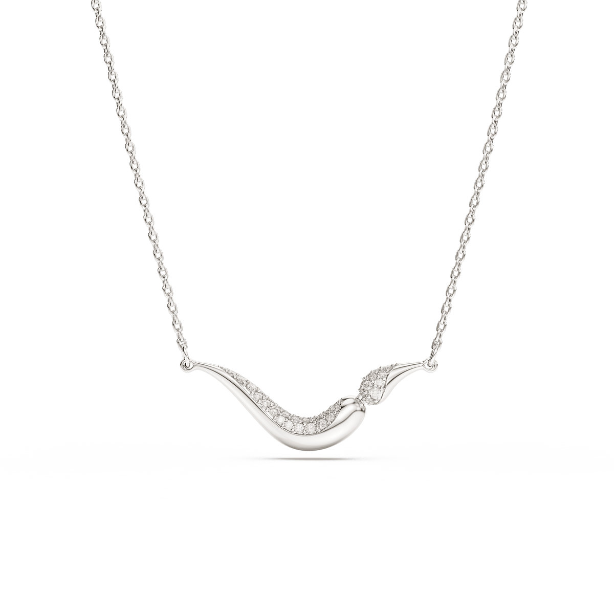 The Swarovski Classica necklace features a wave-shaped pendant in sterling silver, partially adorned with round-cut sparkling Swarovski Zirconia crystals, and is elegantly displayed on a white background.