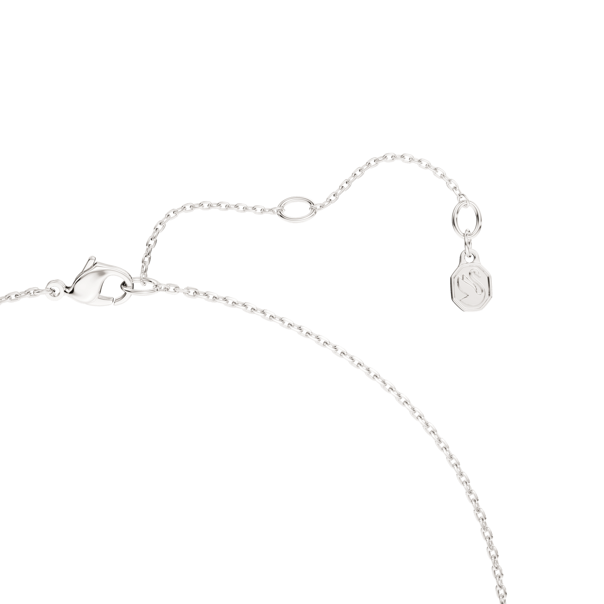 A close-up of the Swarovski Classica pendant, featuring a round cut design on a long sterling silver chain with a lobster clasp and extension chain finished with a small engraved charm. Crafted from sterling silver, this elegant Swarovski piece is ideal for wearing alone or layering with other necklaces. The background is plain white.