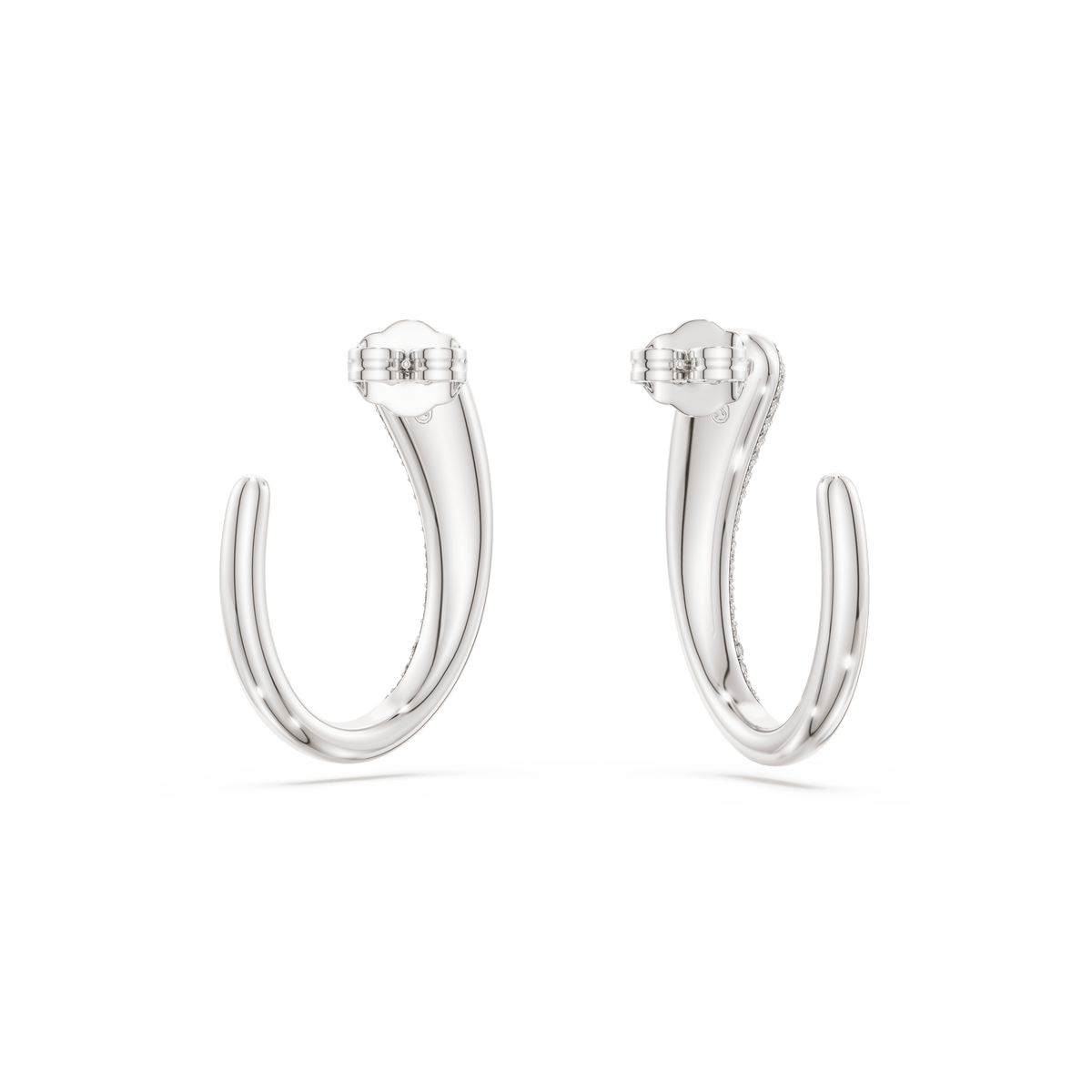 A pair of Swarovski Classica hoop earrings featuring round-cut white stones and secure clasp backs, crafted from recycled sterling silver by Swarovski, showcased against a plain white background.
