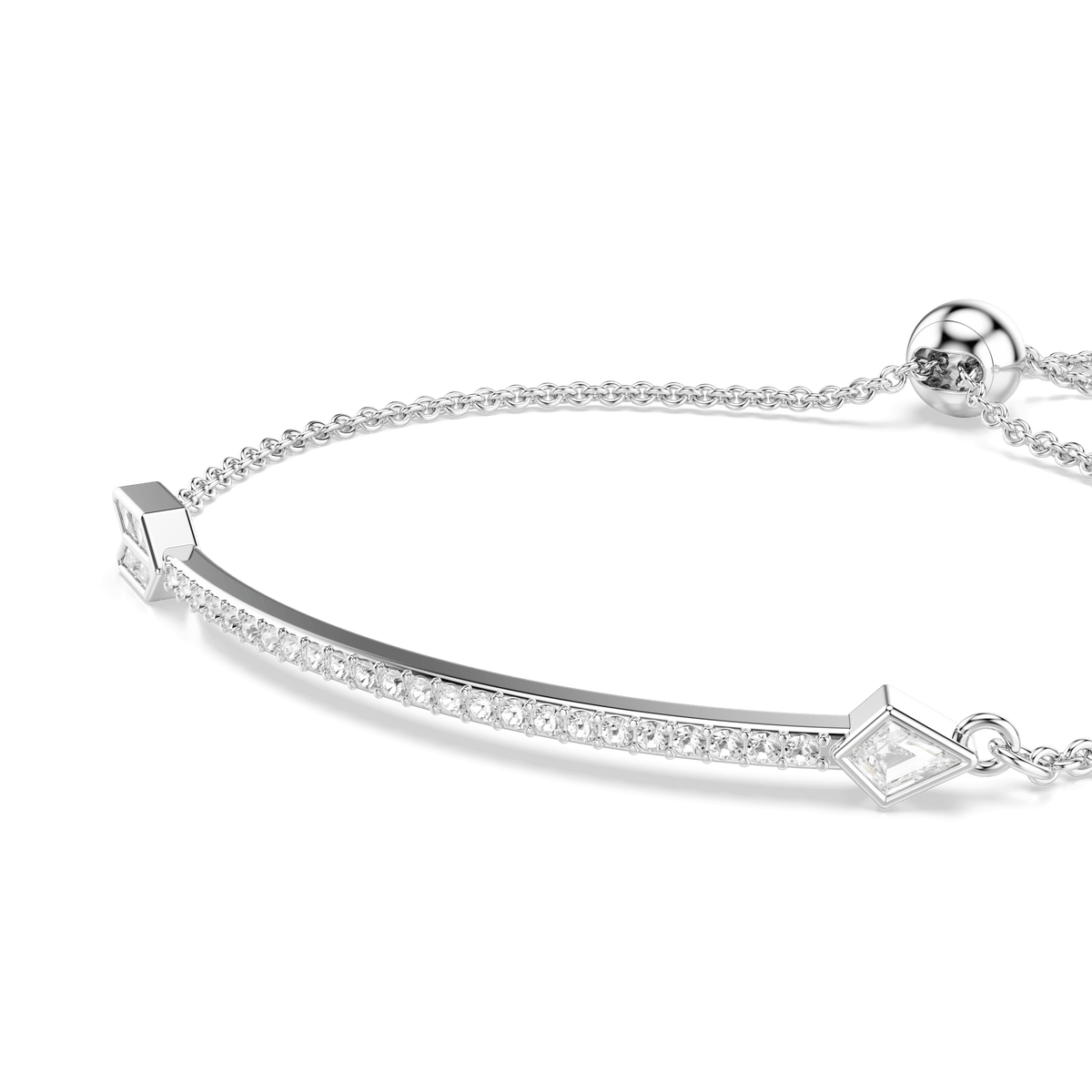 The Swarovski Idyllia bracelet features a rhodium plated curved bar adorned with mixed-cut, sparkling white crystals in an elegant arrow motif, complemented by geometric end pieces and finished with a fine adjustable chain.