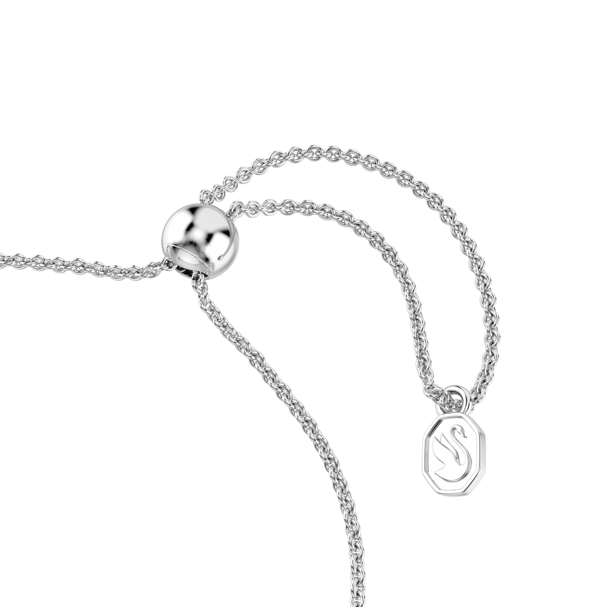 Close-up of the Swarovski Idyllia bracelet, a rhodium plated adjustable chain with mixed-cut white stones and an arrow motif, featuring a round sliding clasp, displayed on a plain white background.