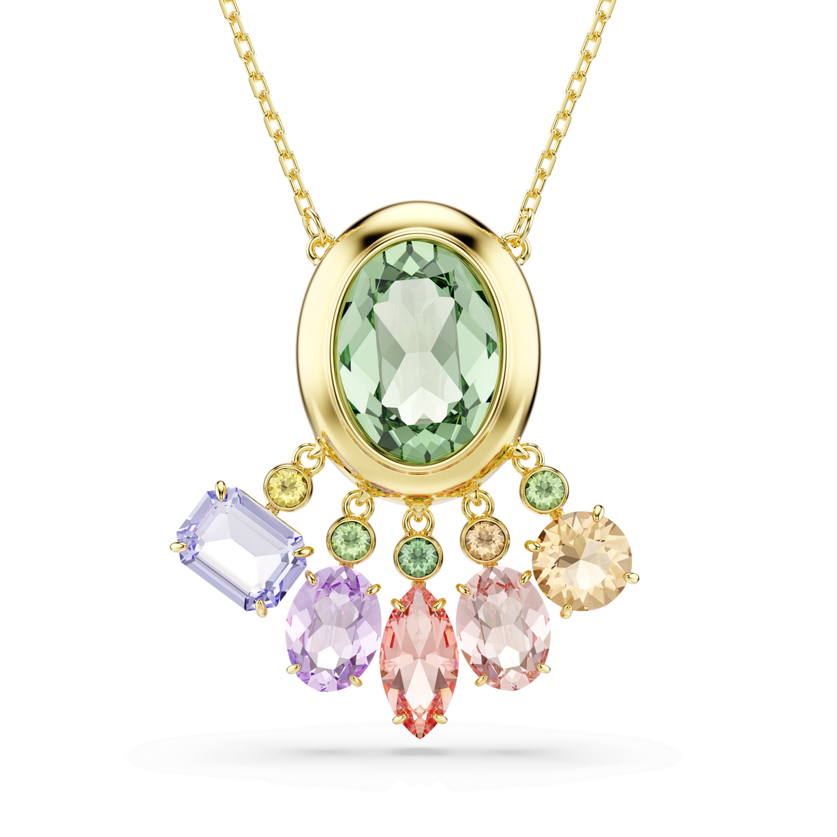 Swarovski Gema pendant by Swarovski, featuring multicolored mixed-cut dangling crystals below an oval green crystal, crafted with an 18K gold finish and displayed on a white background.