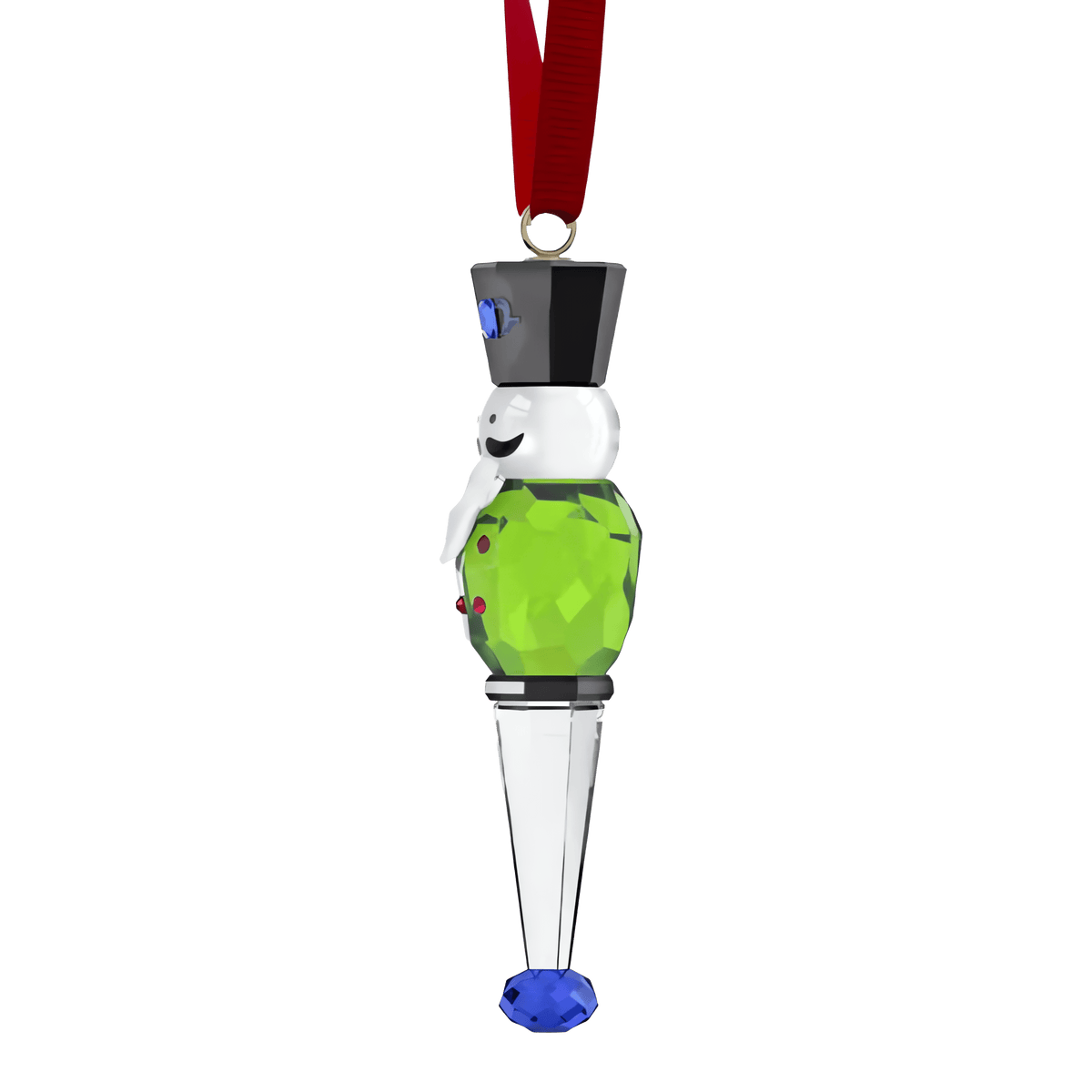 The Swarovski Holiday Cheers Nutcracker Ornament, Green by Swarovski features a crystallized design shaped like a nutcracker with a black hat, green body, and clear legs. Accented with a blue jewel at the tip and suspended from a red ribbon against a white background, it makes a charming addition to your holiday décor.