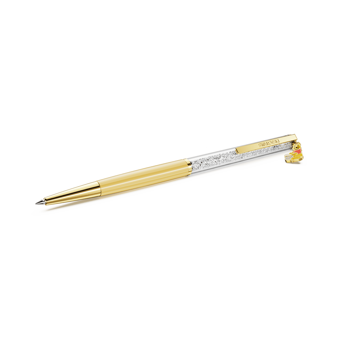 The Swarovski Crystalline ballpoint pen, Winnie the Pooh edition, features a yellow lacquered barrel, a gold-tone plated finish, and is adorned with a small decorative Winnie the Pooh bear charm on the clip. This elegant Disney-inspired pen by Swarovski is positioned diagonally against a white background.