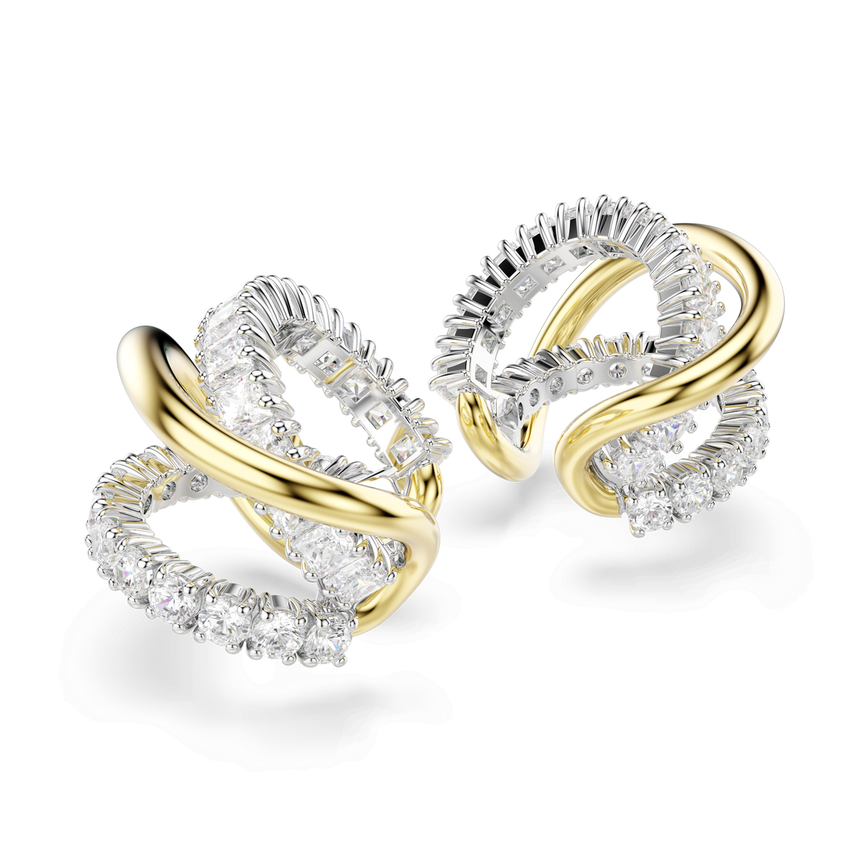 The Swarovski Hyperbola ear cuffs by Swarovski feature intertwining bands in a mixed metal finish, with a gold band elegantly wrapping around a silver band adorned with sparkling white Swarovski Zirconia gemstones, all showcased against a white background.