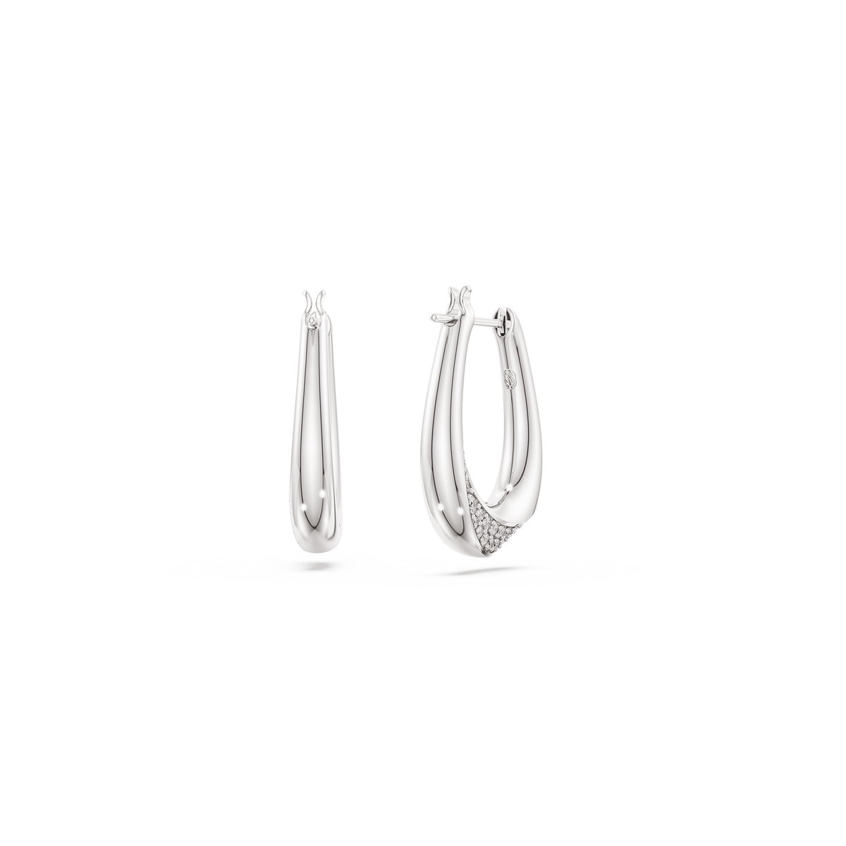 A pair of Swarovski Classica hoop earrings crafted from sterling silver, each featuring a smooth teardrop-shaped design with one earring adorned at the bottom by a cluster of small, sparkling round-cut Swarovski Zirconia stones in white.