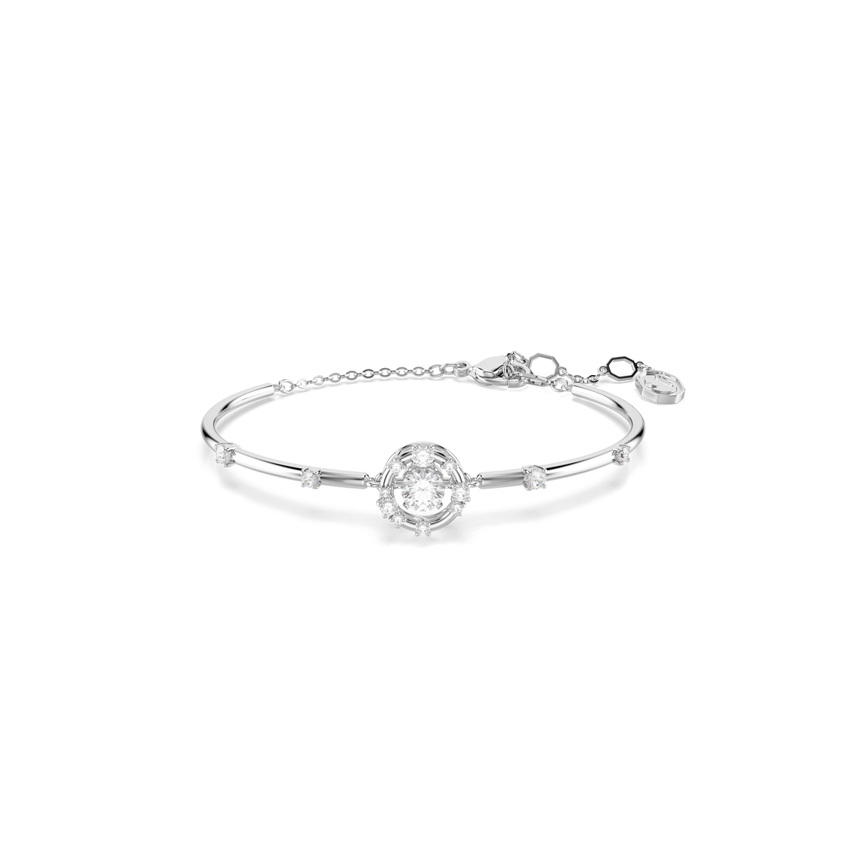 The Swarovski Constella bangle, crafted with a round-cut dancing stone centerpiece and smaller sparkling gems along the rhodium-plated band, features an adjustable chain clasp and is displayed against a plain white background.