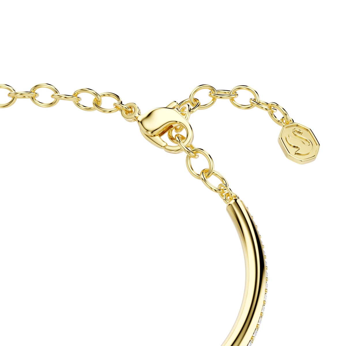 Close-up of the Swarovski Dextera bangle, showcasing its round-cut design with a luxurious 18K gold finish, set against a white background.