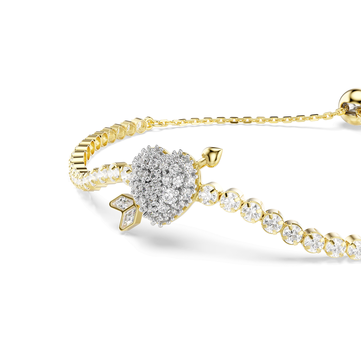 Introducing the Swarovski Idyllia bracelet, a stunning piece with an 18K gold finish, featuring mixed-cut white gemstones and showcasing a heart-shaped charm pierced by an arrow, adorned with delicate leaf details.