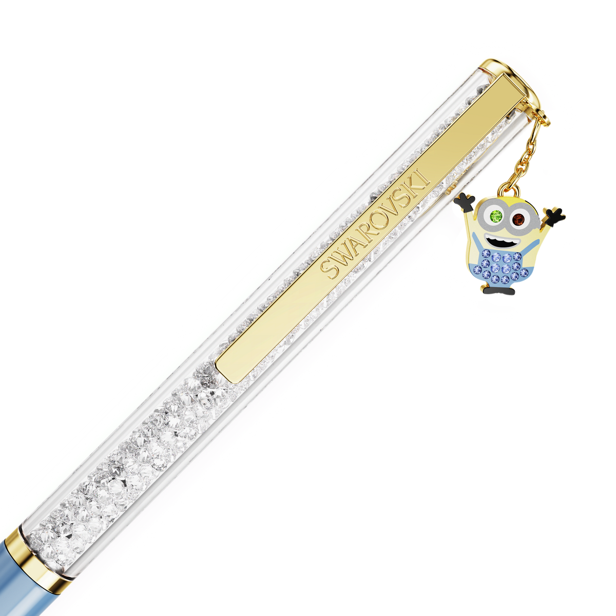 The Swarovski Crystalline ballpoint pen—Minions edition—features a gold-tone plated clip, is filled with sparkling clear crystals, and is accented with a charming Minions Bob charm dangling from the top.