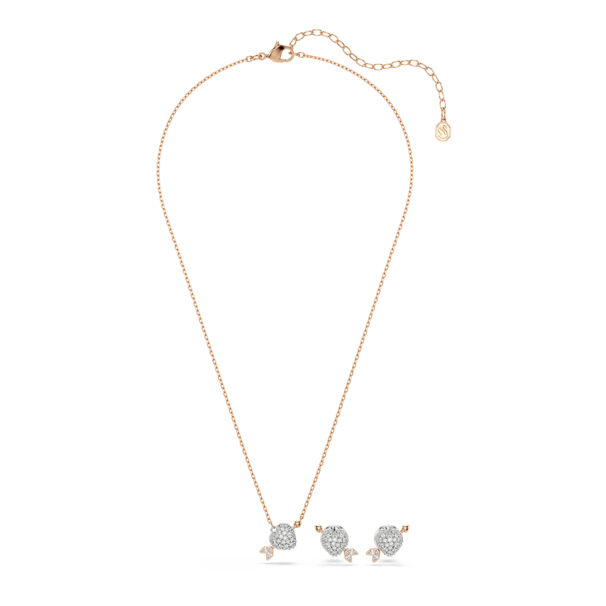 Swarovski Idyllia set, featuring mixed cut heart with arrow motifs adorned with sparkling white stones and enhanced by an exquisite 18K rose gold finish, beautifully displayed on a white background. This elegant Swarovski jewelry set includes a shimmering pendant necklace and matching stud earrings, each detailed for added sophistication.