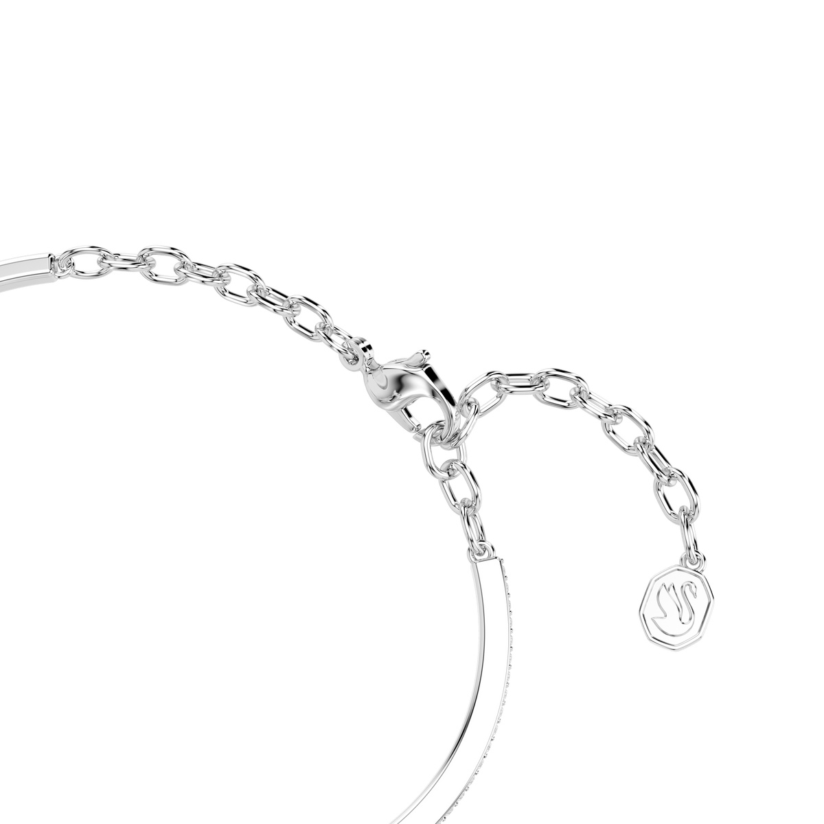 A close-up of the Swarovski Symbolica bracelet by Swarovski, featuring a rhodium-plated chain adorned with a pavé horseshoe charm, and finished with a lobster clasp and extender chain, set against a white background.