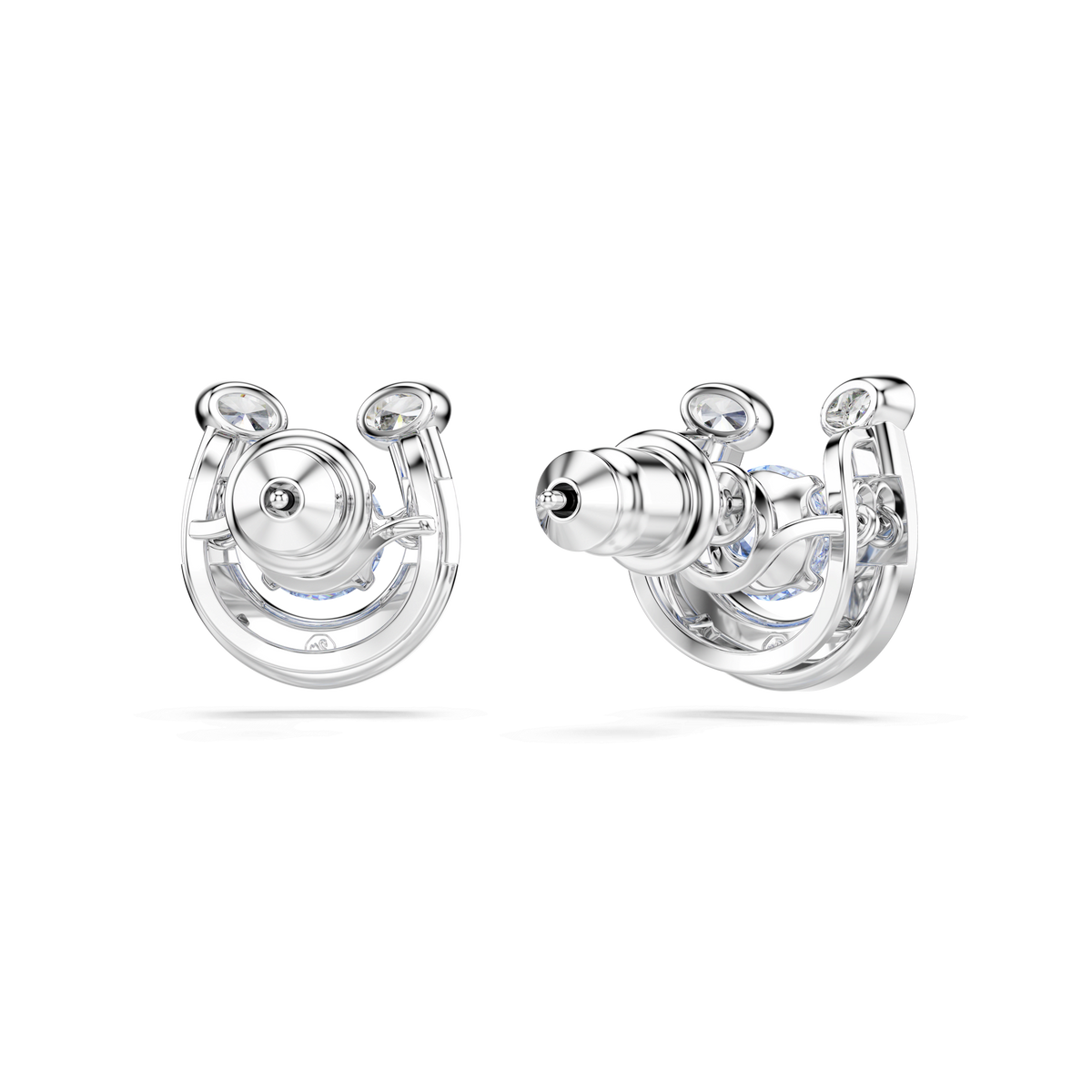 A pair of Swarovski Symbolica stud earrings, featuring round-cut, blue pavé stones in a horseshoe design and finished with rhodium plating, are displayed against a light gray background—showcasing both the front and side views.