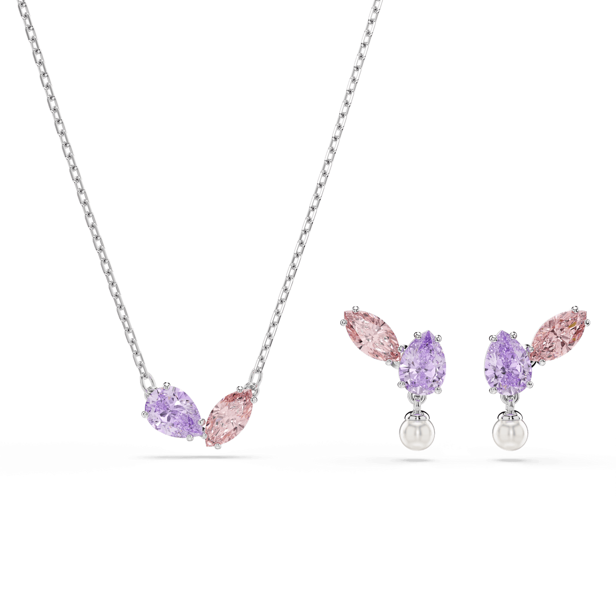 The Swarovski Ariana Grande x Swarovski set features a necklace and earrings with mixed cuts of multicolored Swarovski gemstones in rhodium-plated settings, beautifully displayed on a white background.