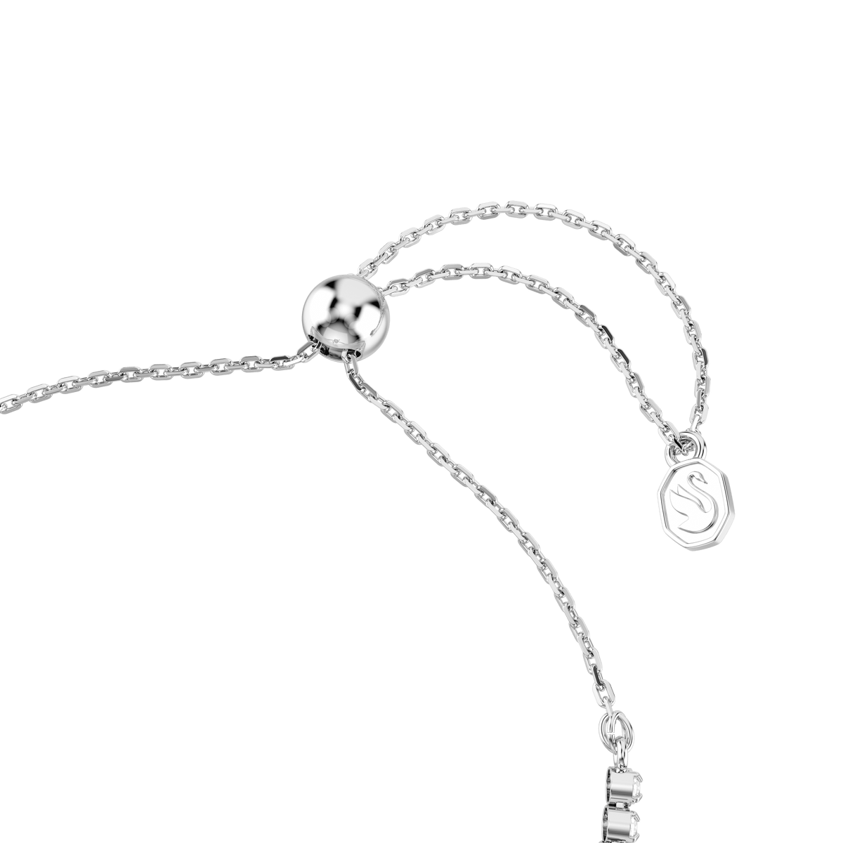 A close-up of the Swarovski Idyllia bracelet—featuring a rhodium plated adjustable chain with a round slider bead and a heart charm pierced by an arrow, adorned with mixed-cut white stones—displayed on a plain white background.